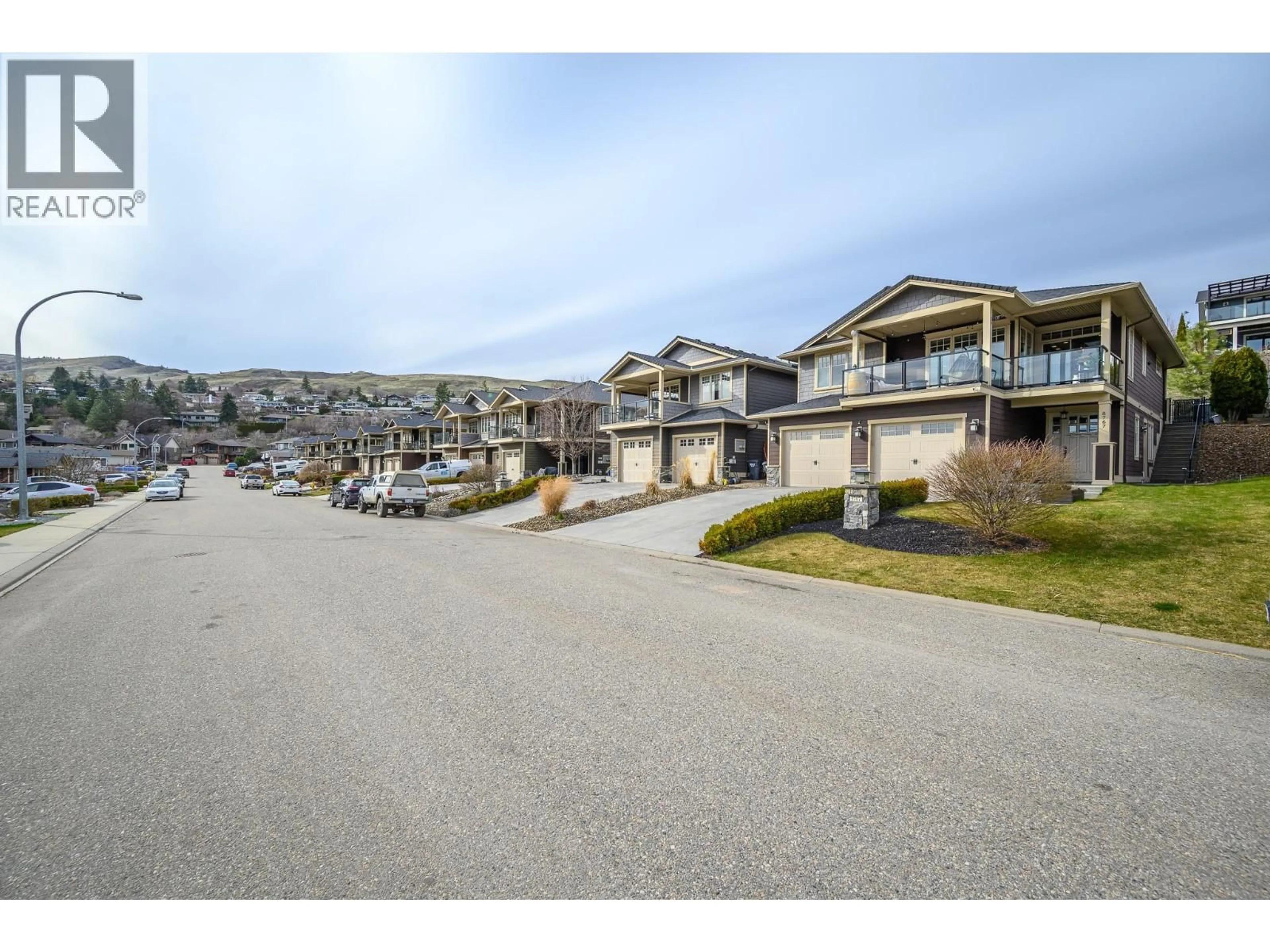 A pic from outside/outdoor area/front of a property/back of a property/a pic from drone, street for 8767 HOFER DRIVE, Coldstream British Columbia V1B1Y8