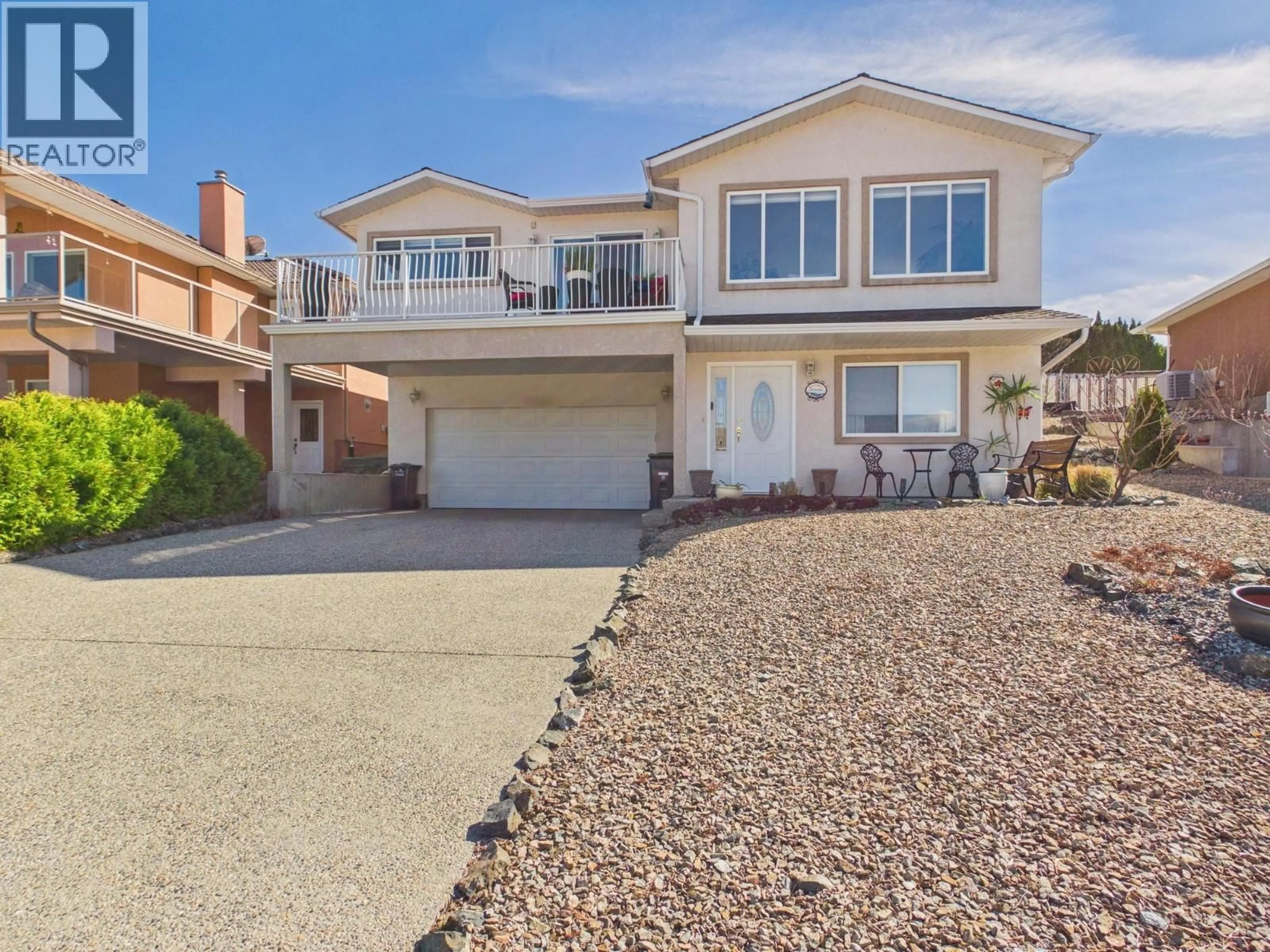 Home with vinyl exterior material, street for 11912 QUAIL RIDGE PLACE, Osoyoos British Columbia V0H1V4