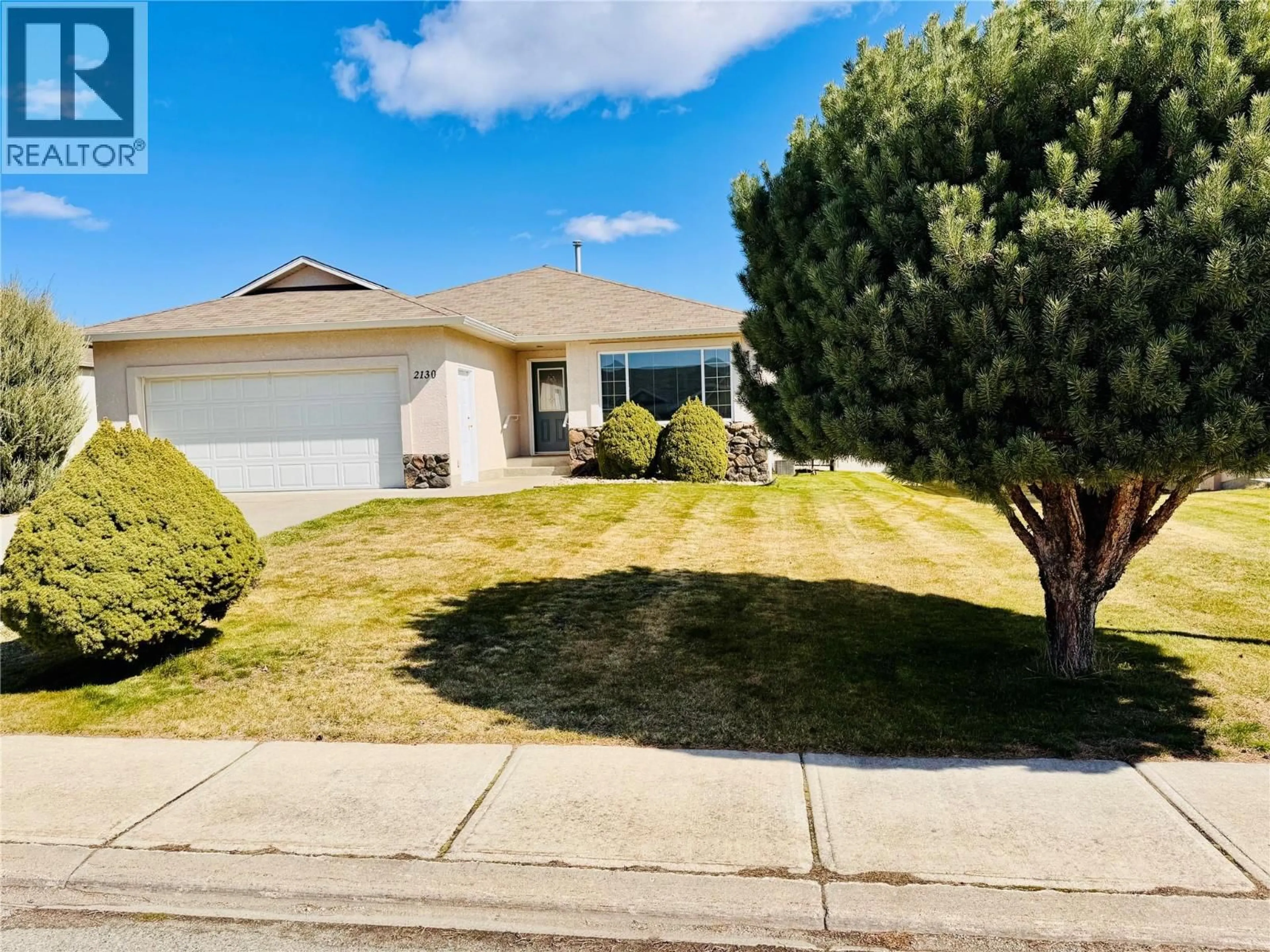 Home with vinyl exterior material, street for 2130 BRYCEN PLACE, Grand Forks British Columbia V0H1H0