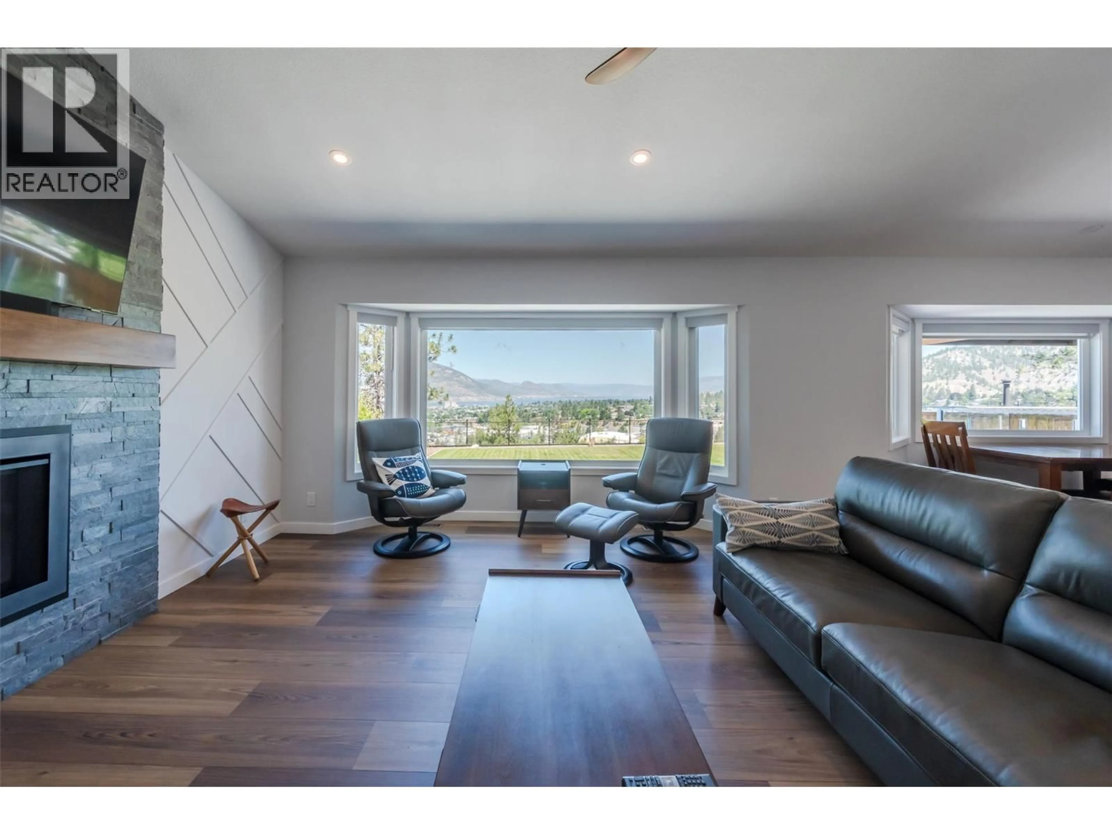 Living room with furniture, wood/laminate floor for 153 WESTVIEW DRIVE, Penticton British Columbia V2A7V9