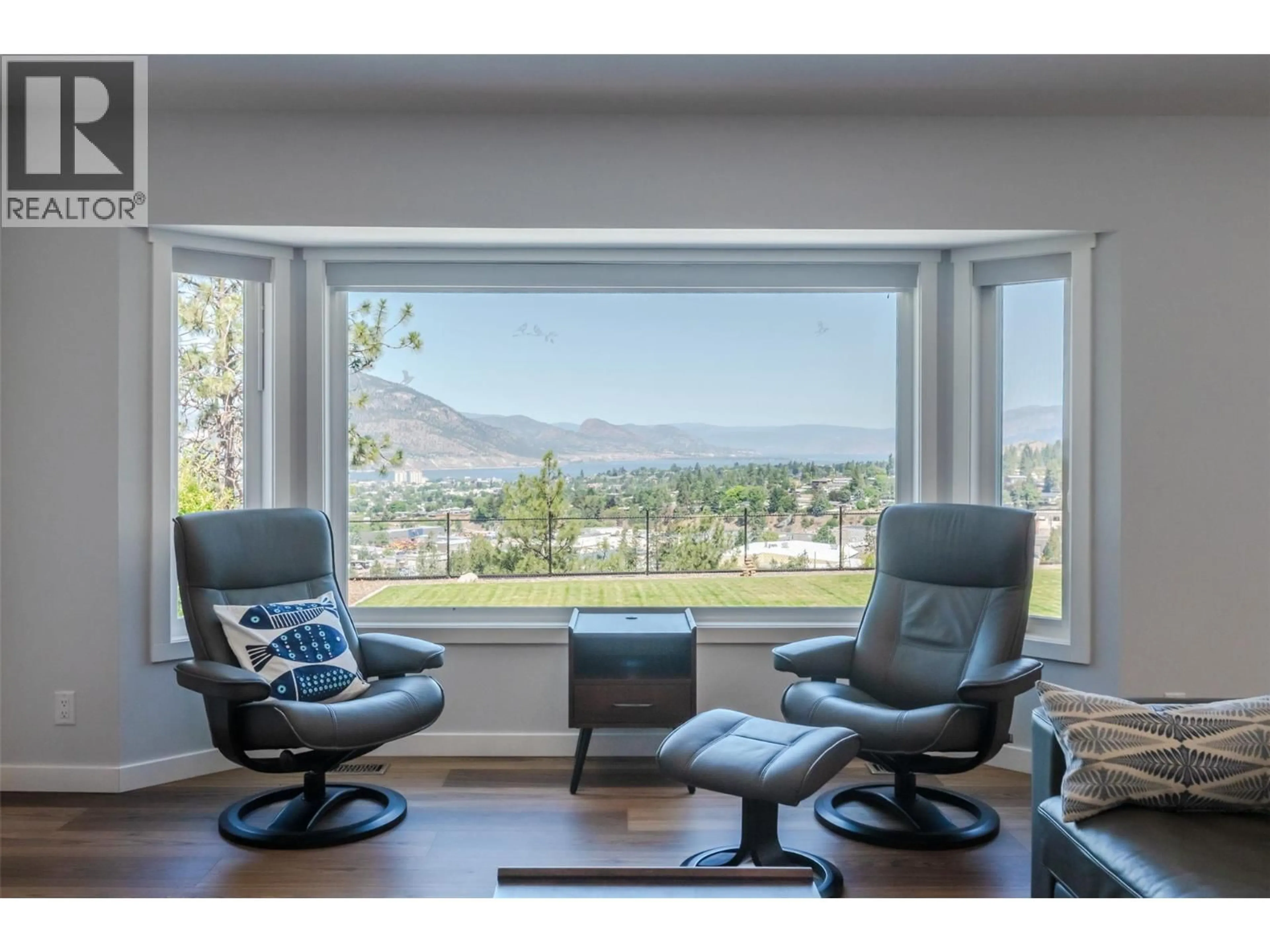 Living room with furniture, wood/laminate floor for 153 WESTVIEW DRIVE, Penticton British Columbia V2A7V9