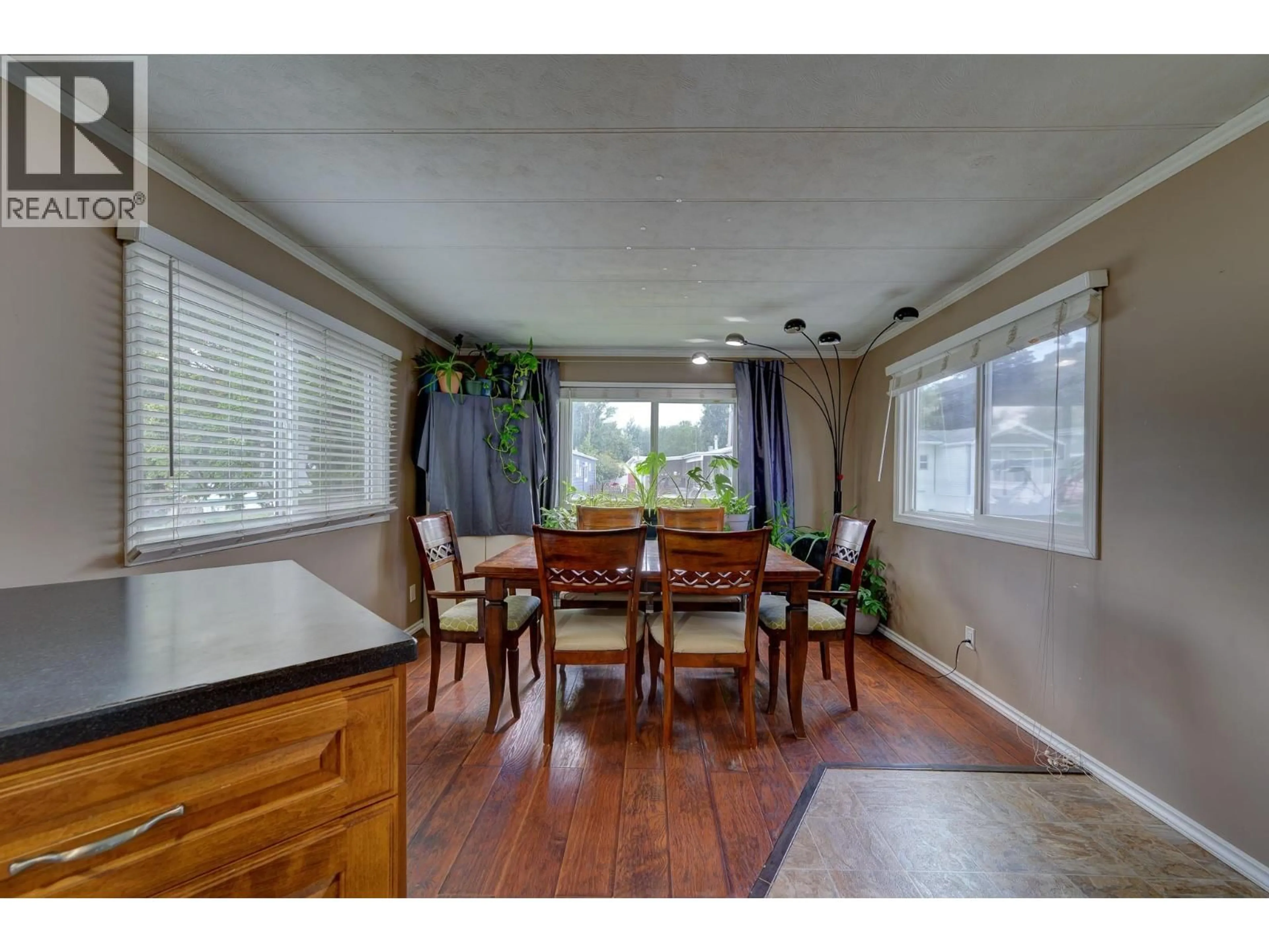 Dining room, wood/laminate floor for 112 - 2400 OAKDALE WAY, Kamloops British Columbia V2B6W7