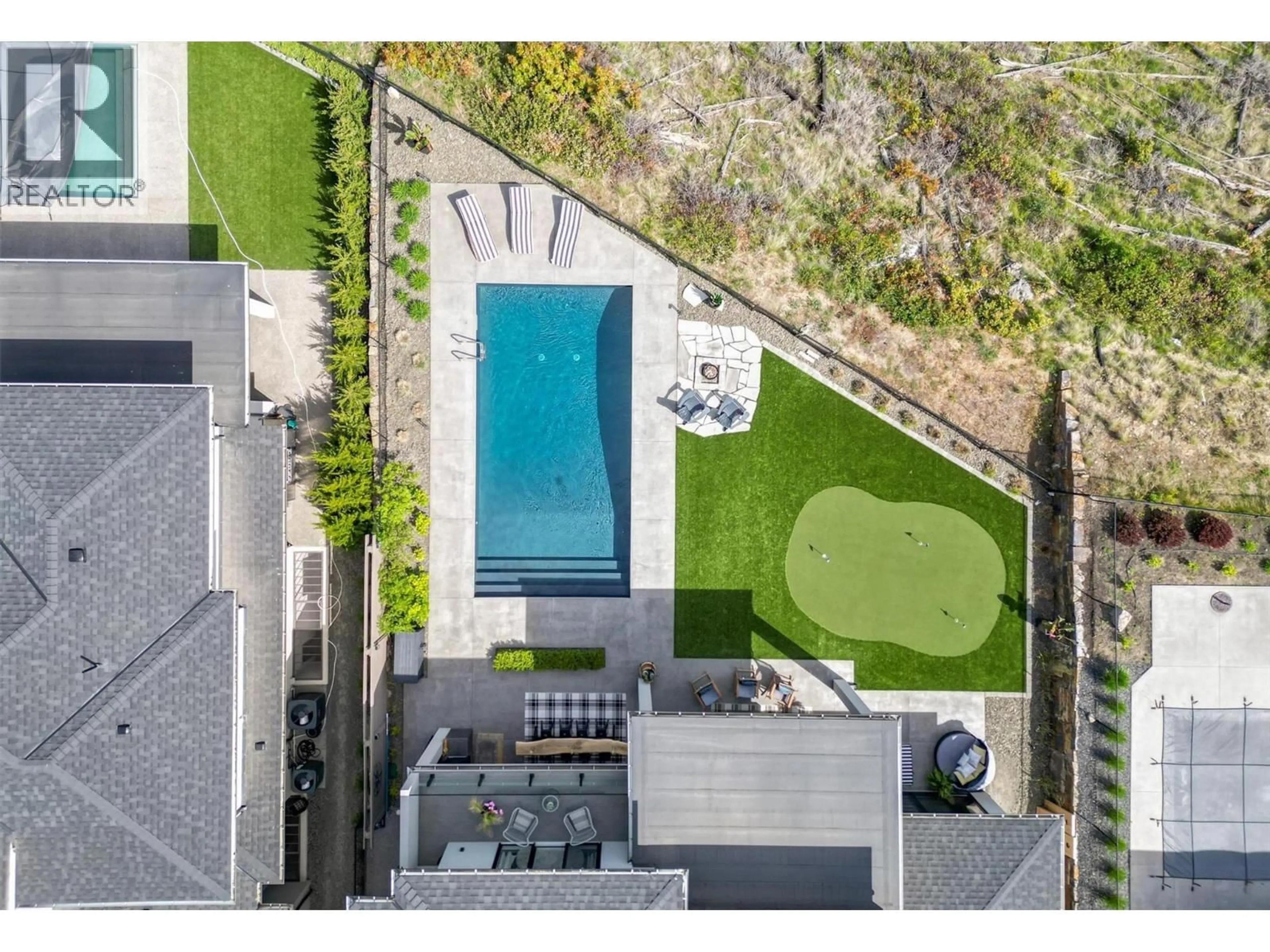 A pic from outside/outdoor area/front of a property/back of a property/a pic from drone, street for 1612 VINCENT PLACE, Kelowna British Columbia V1W5N9