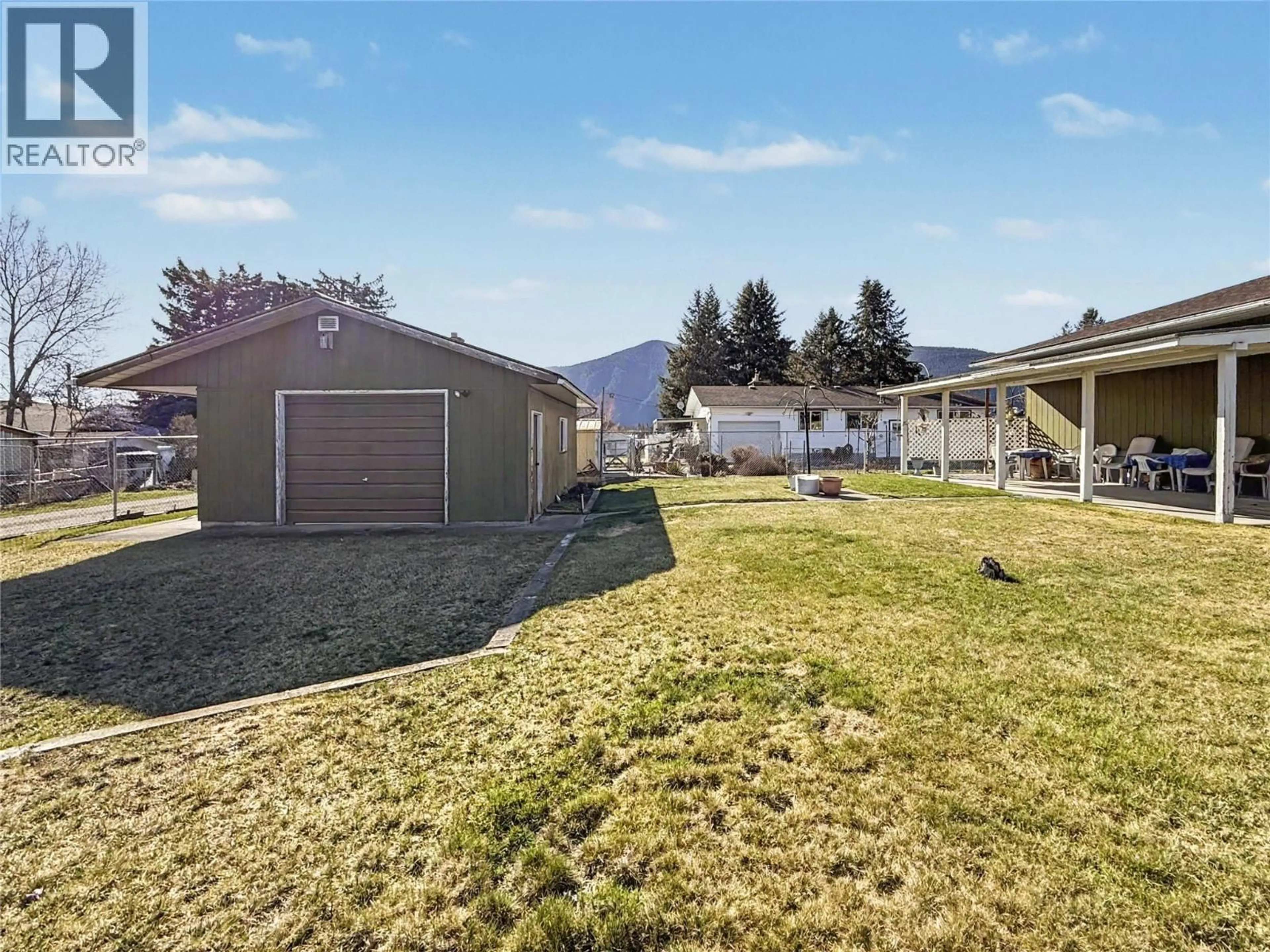 A pic from outside/outdoor area/front of a property/back of a property/a pic from drone, mountain view for 7430 22ND STREET, Grand Forks British Columbia V0H1H0