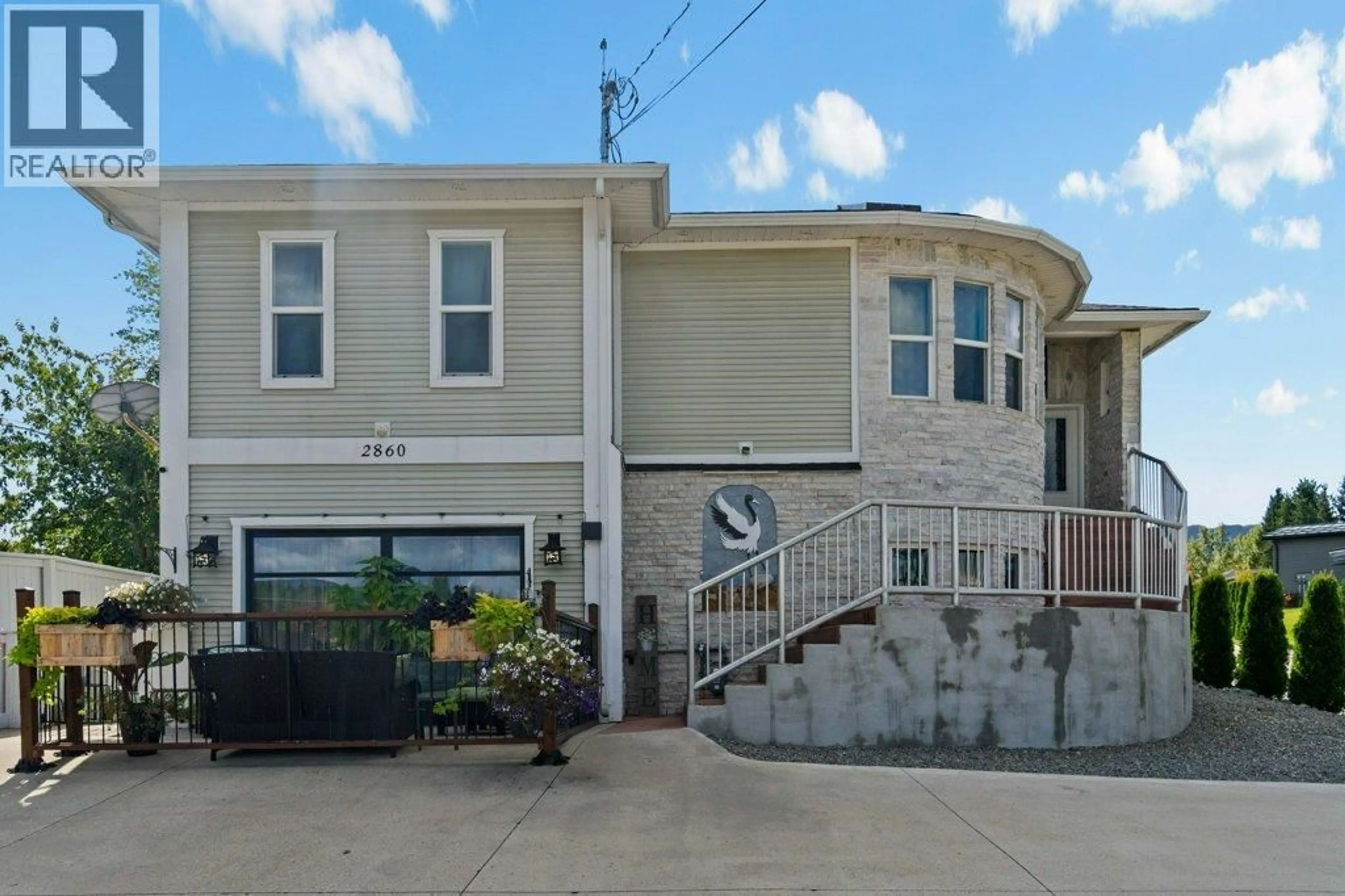 Home with vinyl exterior material, street for 2860 15 AVENUE NORTHEAST, Salmon Arm British Columbia V1E2B6