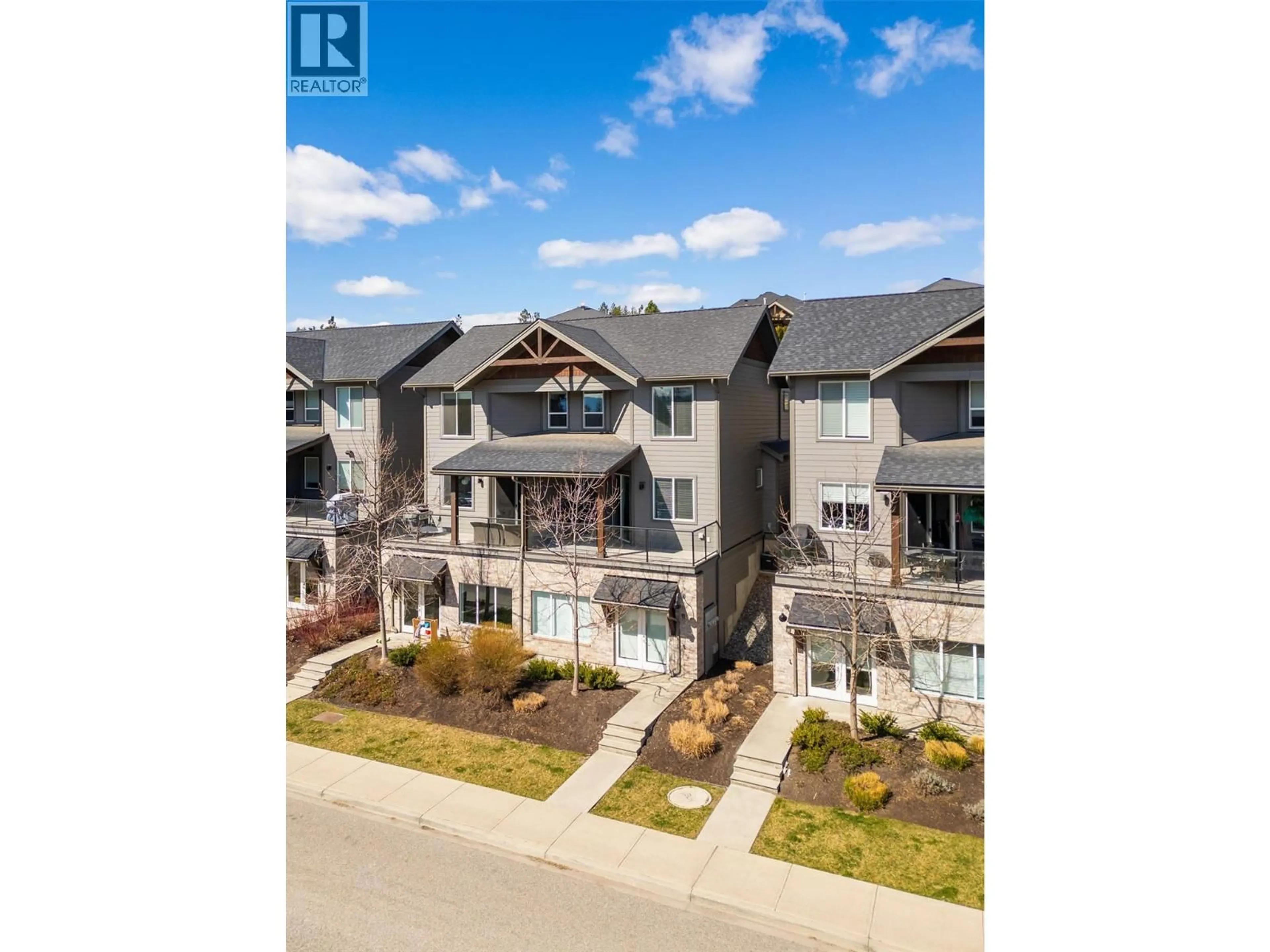 A pic from outside/outdoor area/front of a property/back of a property/a pic from drone, street for 11 - 12840 STILLWATER COURT, Lake Country British Columbia V4V2N1