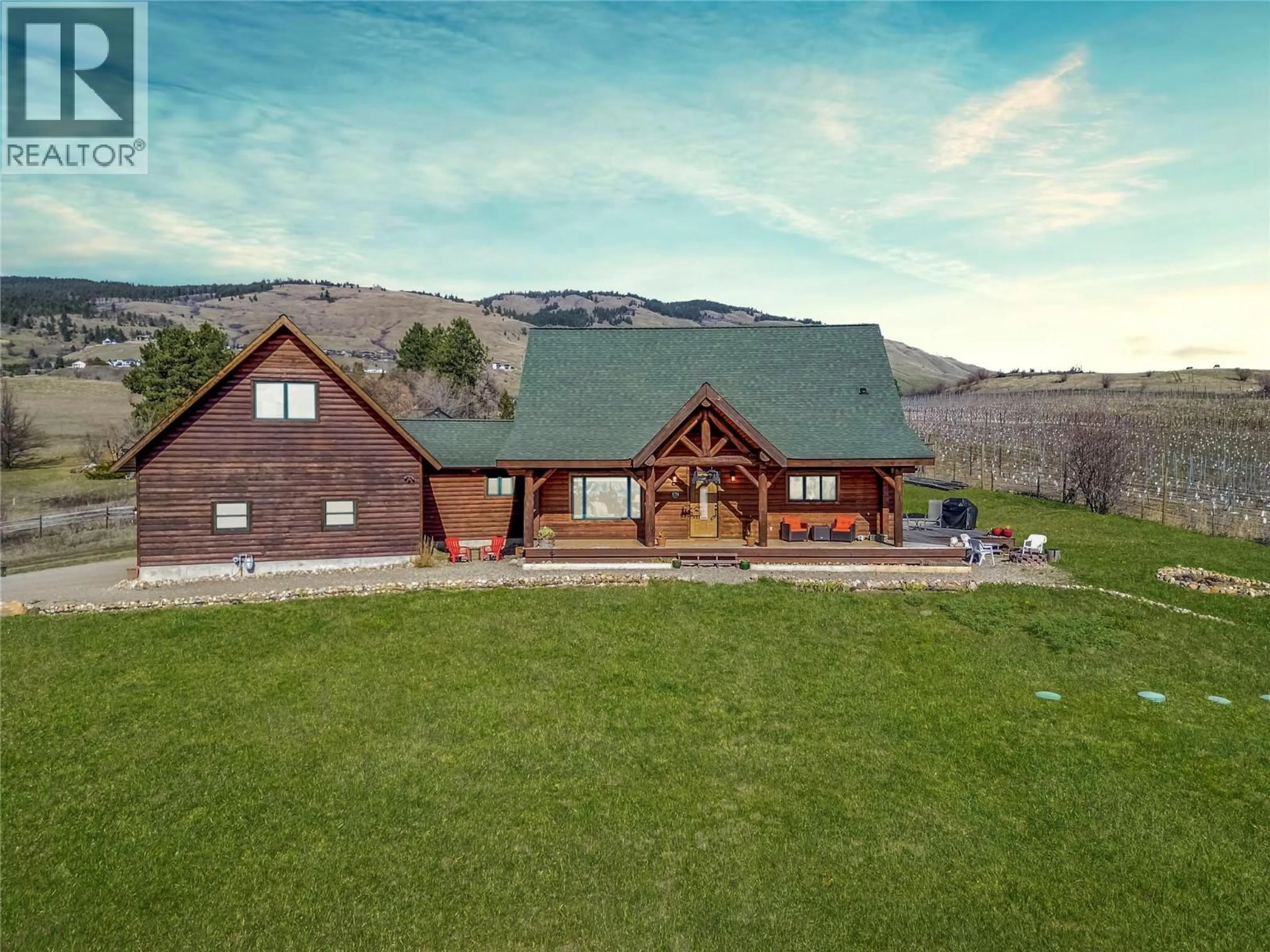 A pic from outside/outdoor area/front of a property/back of a property/a pic from drone, mountain view for 9371 6 HIGHWAY, Coldstream British Columbia V1B3B5