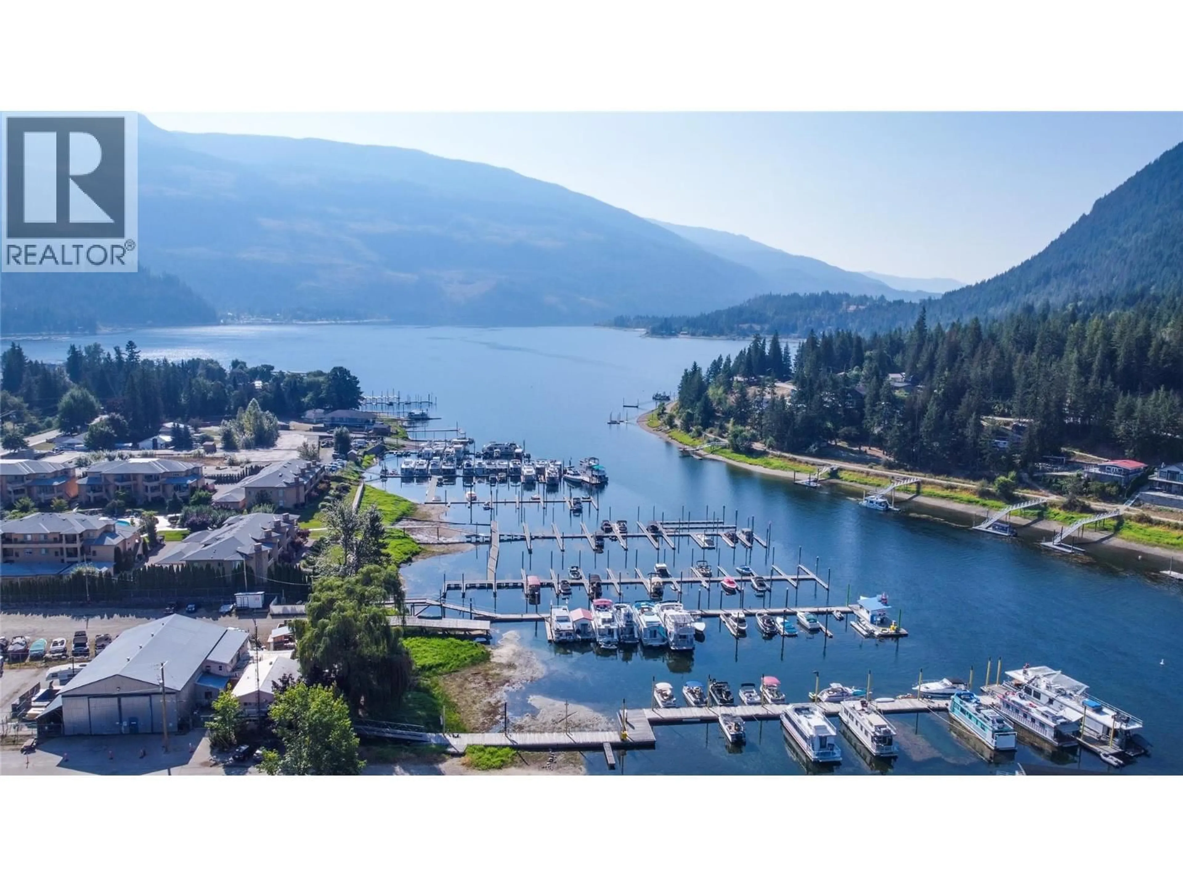 A pic from outside/outdoor area/front of a property/back of a property/a pic from drone, water/lake/river/ocean view for 111 - 1002 RIVERSIDE AVENUE, Sicamous British Columbia V0E2V1