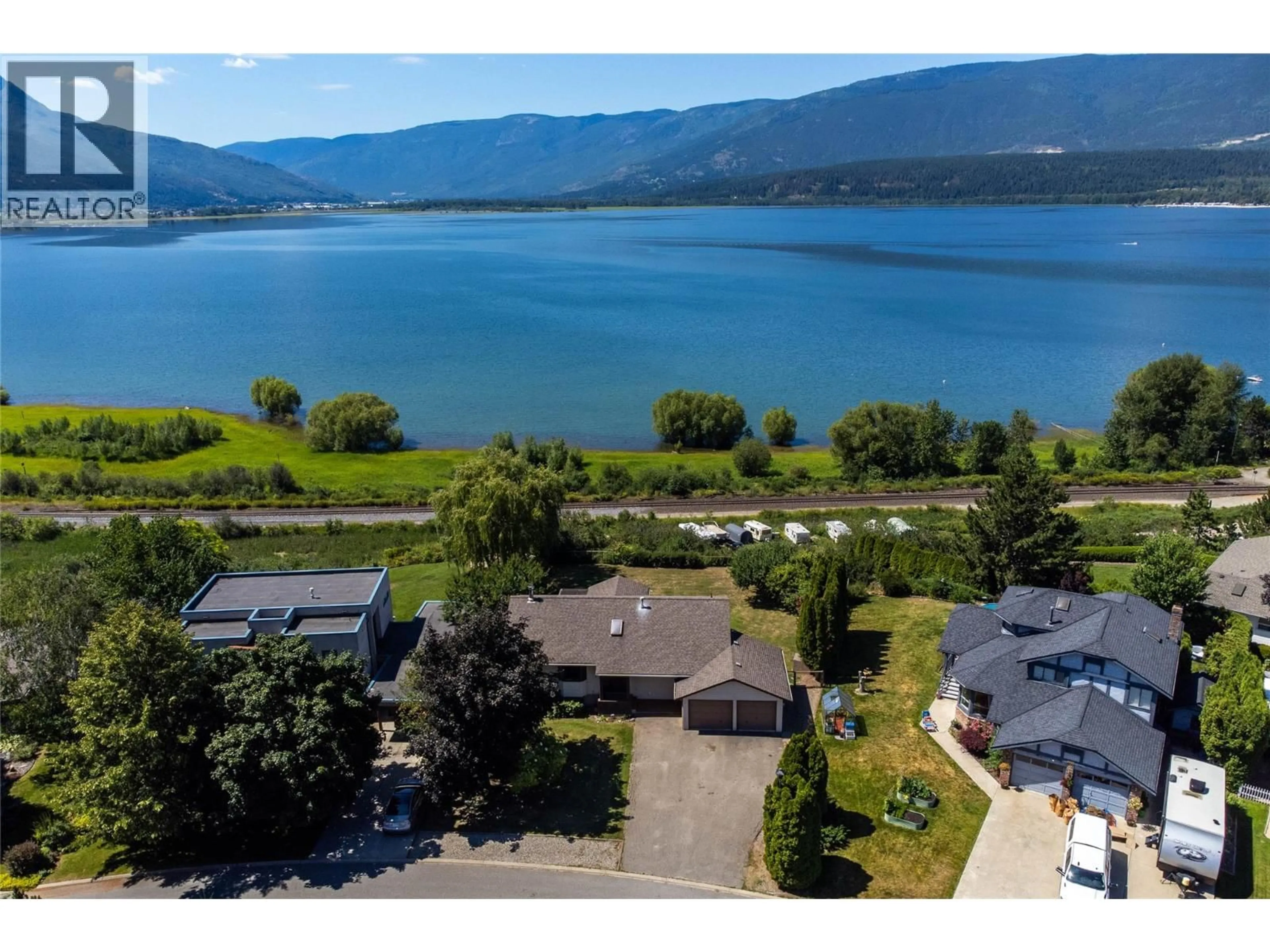 A pic from outside/outdoor area/front of a property/back of a property/a pic from drone, water/lake/river/ocean view for 4591 13 STREET NORTHEAST, Salmon Arm British Columbia V1E1E3