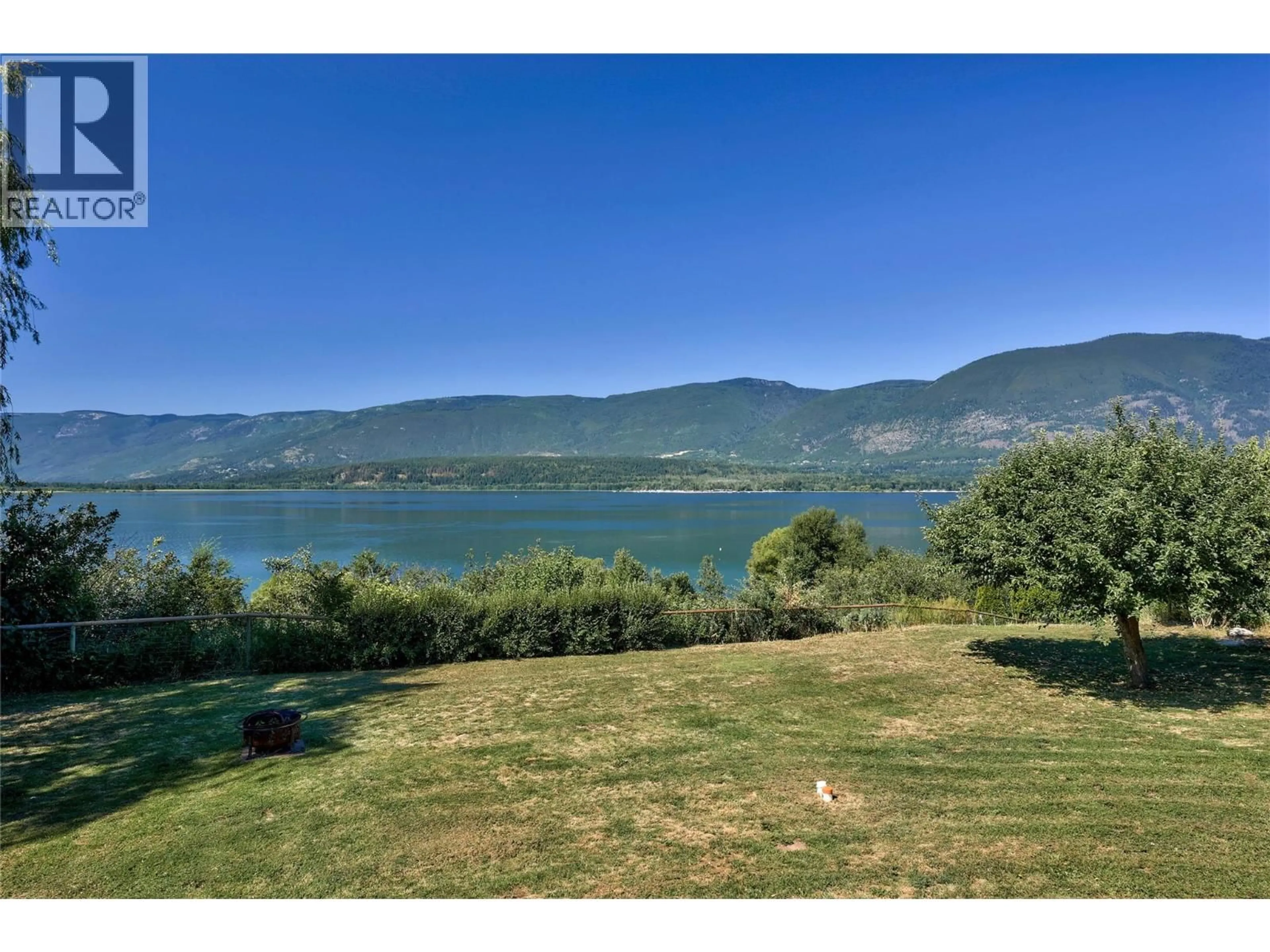 A pic from outside/outdoor area/front of a property/back of a property/a pic from drone, water/lake/river/ocean view for 4591 13 STREET NORTHEAST, Salmon Arm British Columbia V1E1E3