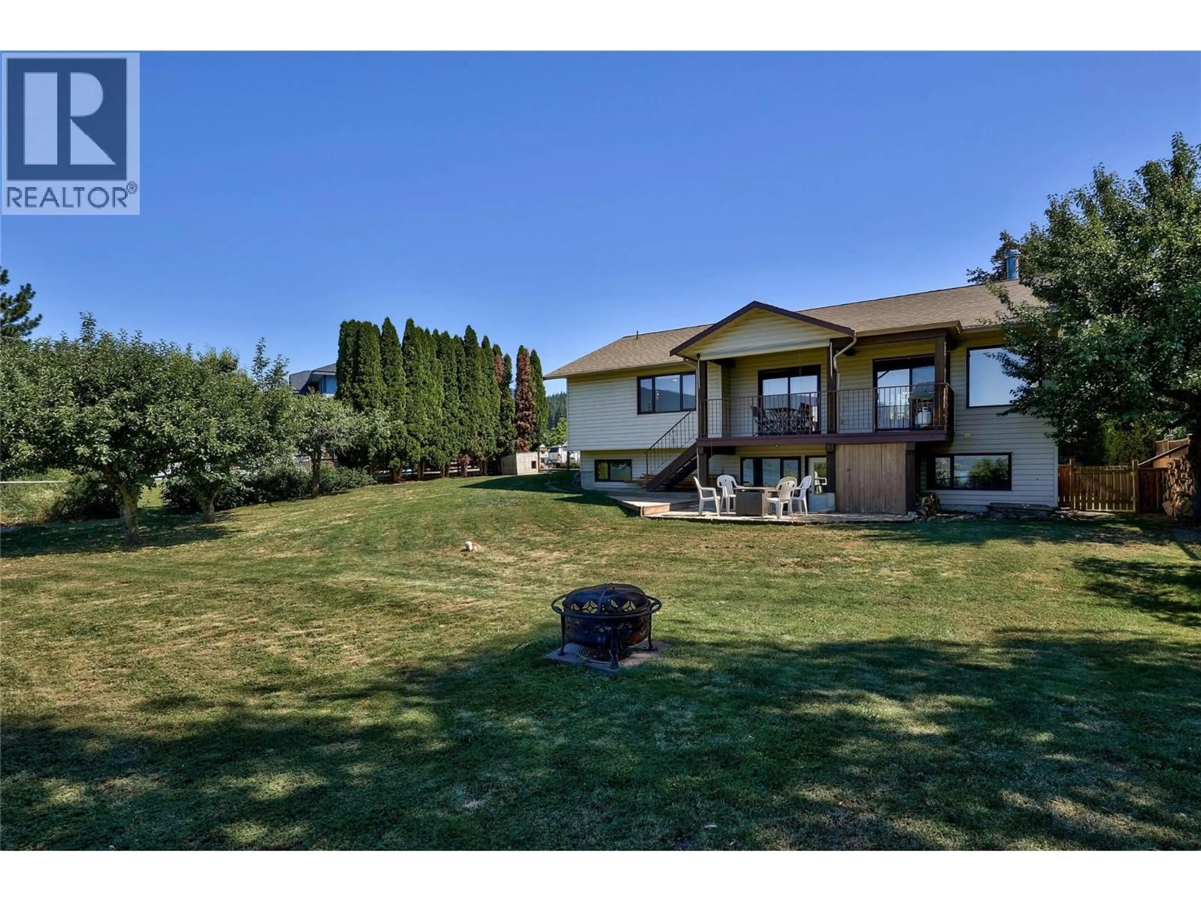 A pic from outside/outdoor area/front of a property/back of a property/a pic from drone, water/lake/river/ocean view for 4591 13 STREET NORTHEAST, Salmon Arm British Columbia V1E1E3