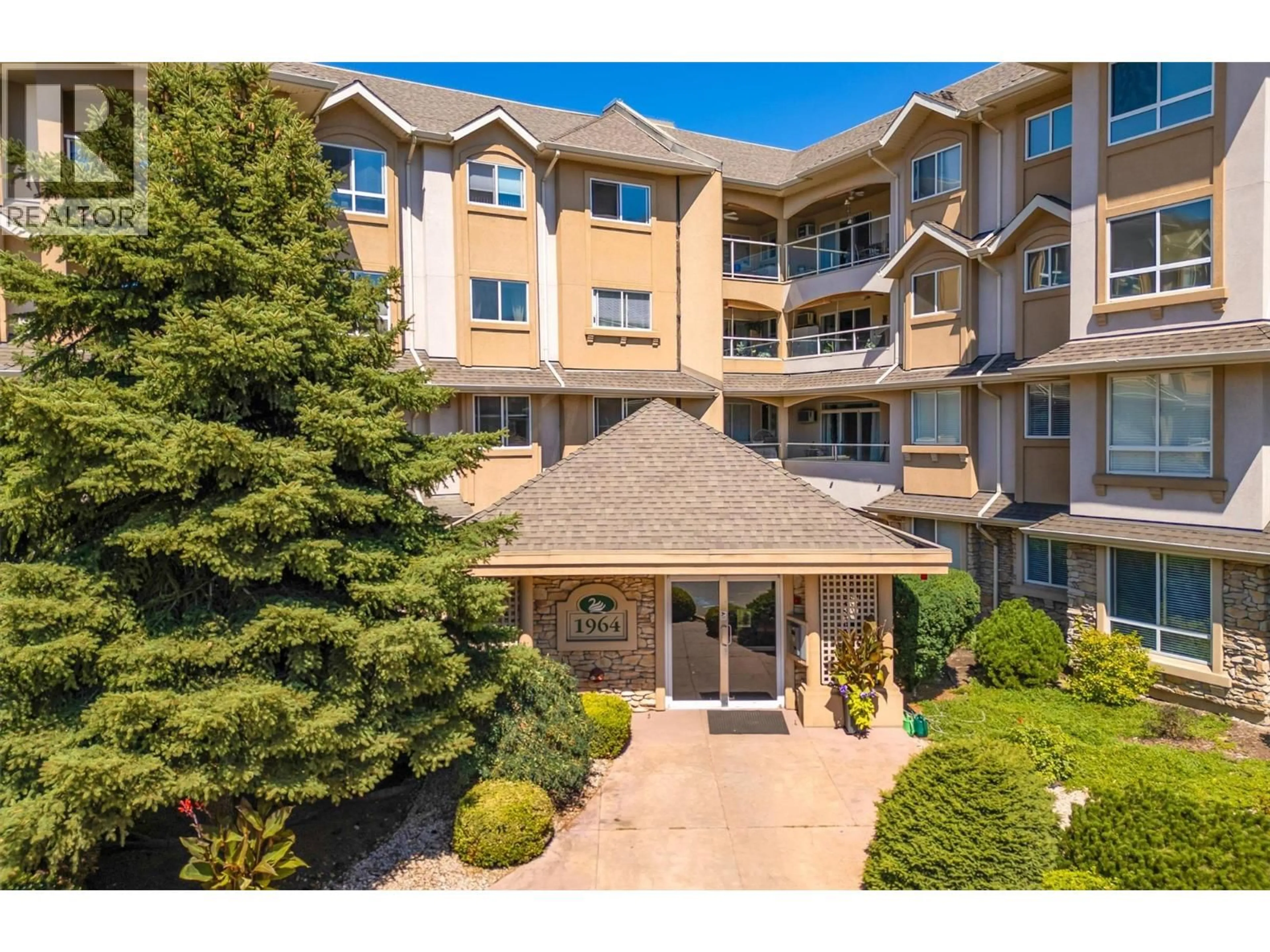 A pic from outside/outdoor area/front of a property/back of a property/a pic from drone, unknown for 309 - 1964 ENTERPRISE WAY, Kelowna British Columbia V1Y9S7