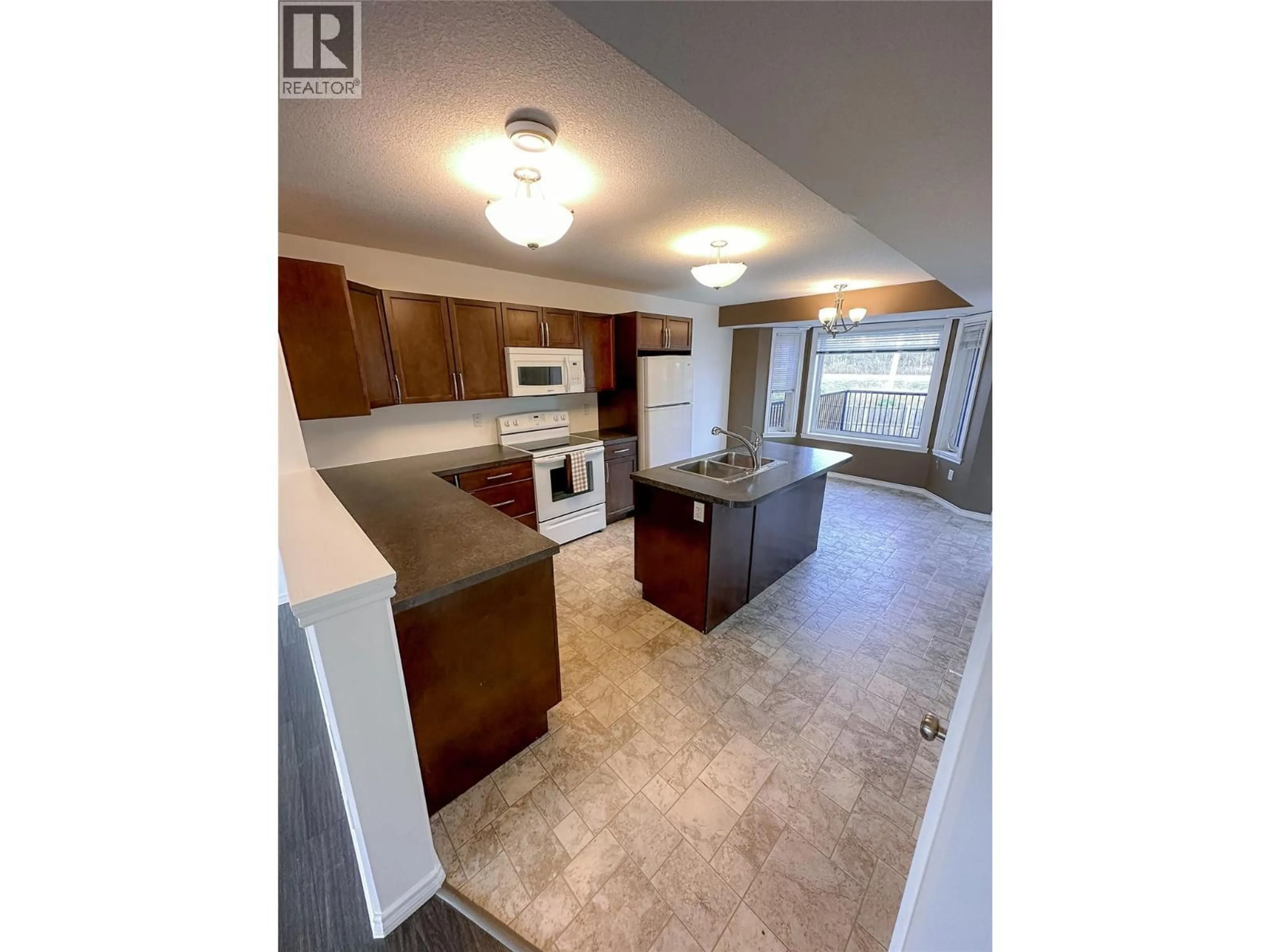 Open concept kitchen, unknown for 8300 17A STREET, Dawson Creek British Columbia V1G0E1