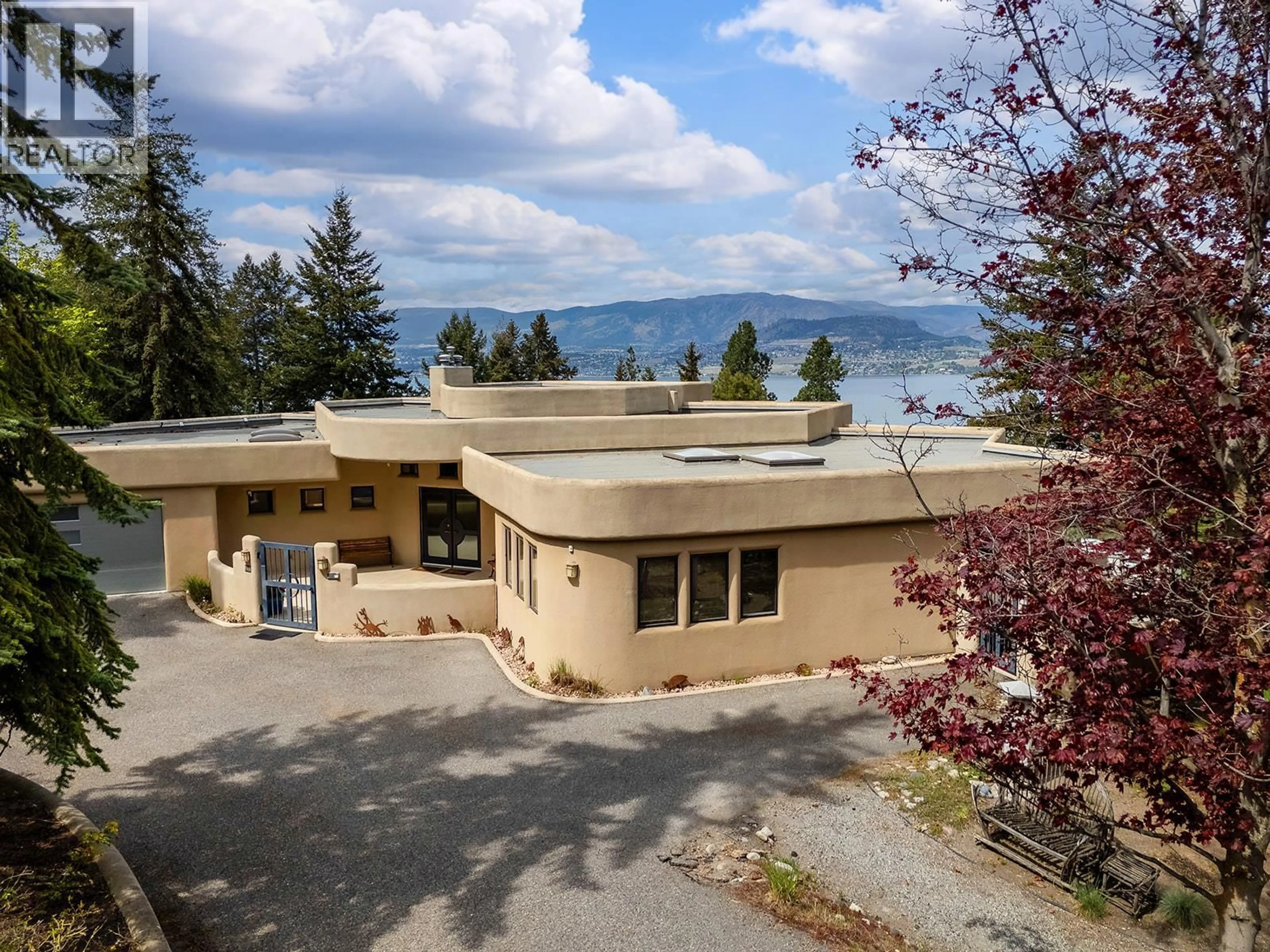 A pic from outside/outdoor area/front of a property/back of a property/a pic from drone, mountain view for 339 UPLANDS DRIVE, Kelowna British Columbia V1W4J7