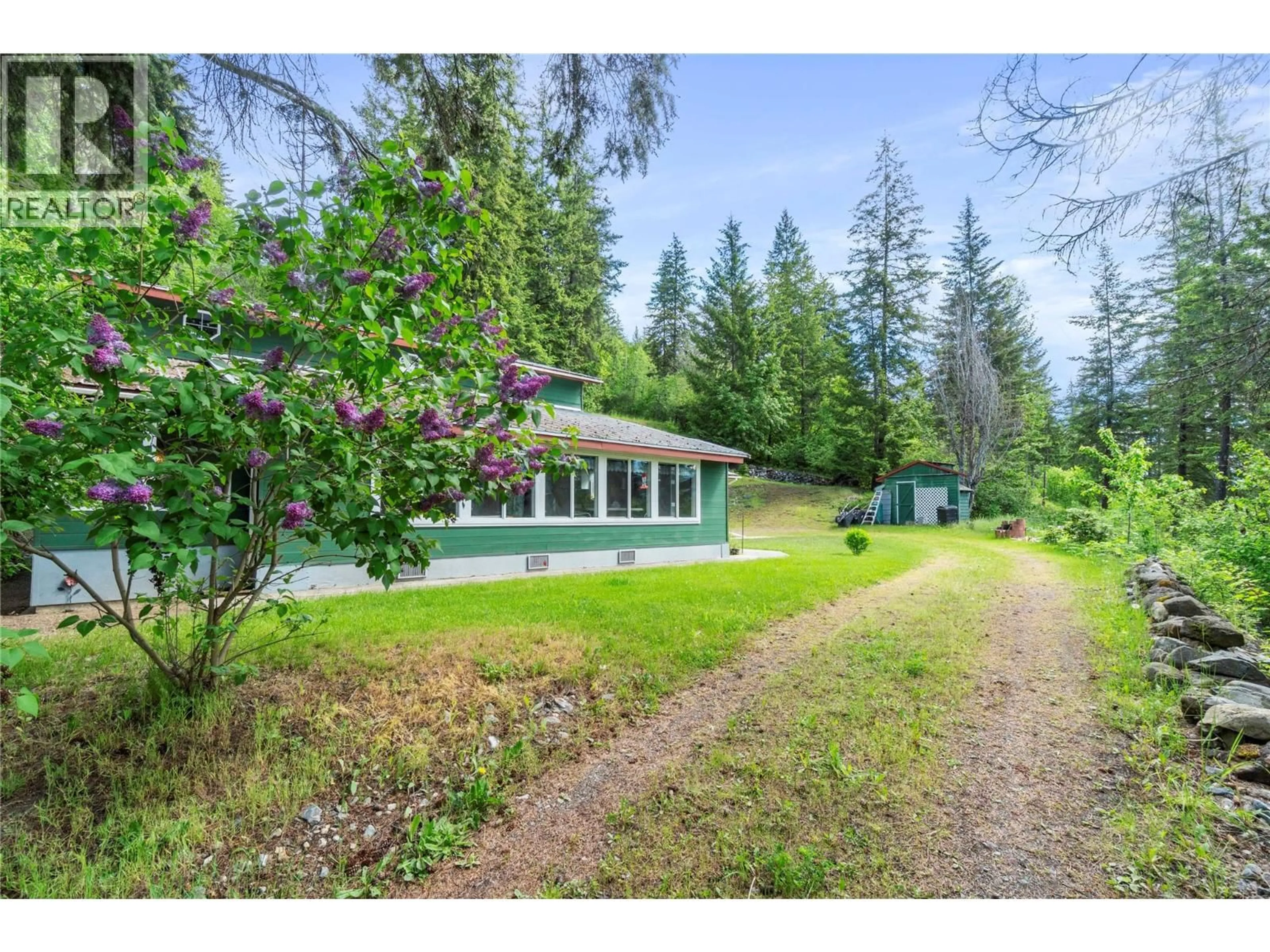 A pic from outside/outdoor area/front of a property/back of a property/a pic from drone, forest/trees view for 6497 LINDSAY ROAD, Magna Bay British Columbia V0E1M7