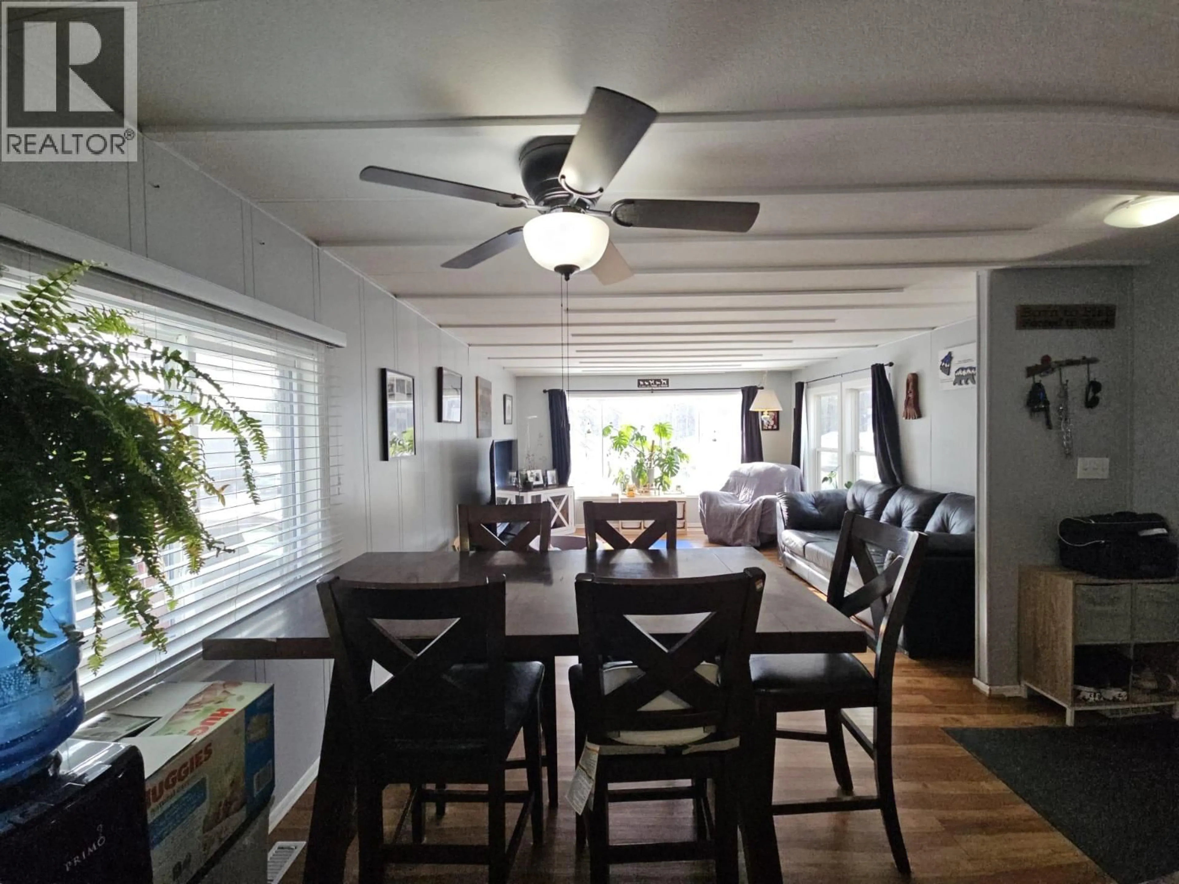 Dining room, wood/laminate floor for 5256 45 STREET SOUTHEAST, Chetwynd British Columbia V0C1J0