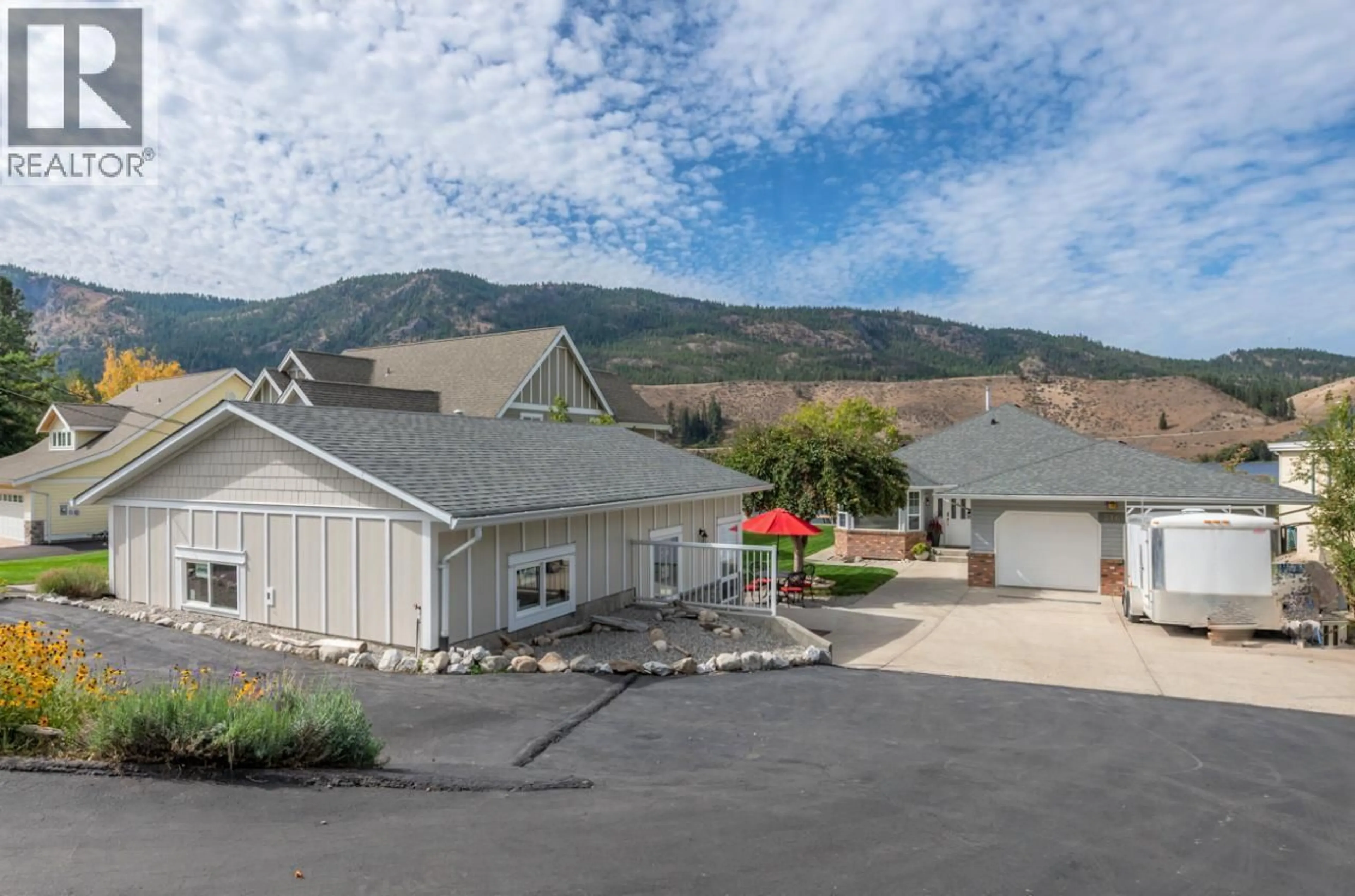 A pic from outside/outdoor area/front of a property/back of a property/a pic from drone, mountain view for 516 HODY DRIVE, Okanagan Falls British Columbia V0H1R7
