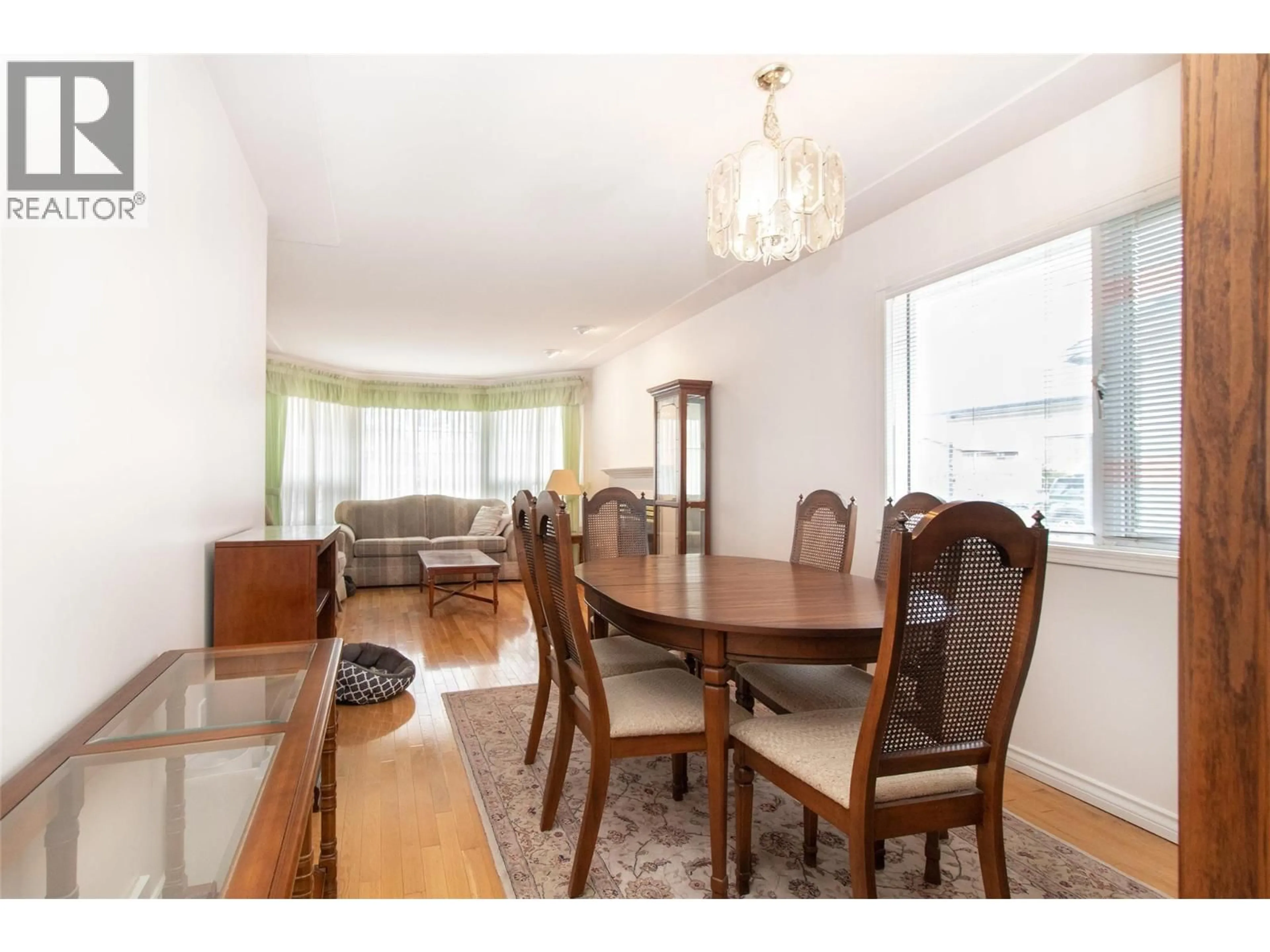 Dining room, wood/laminate floor for 1035 TATARYN ROAD, Kelowna British Columbia V1X1N6