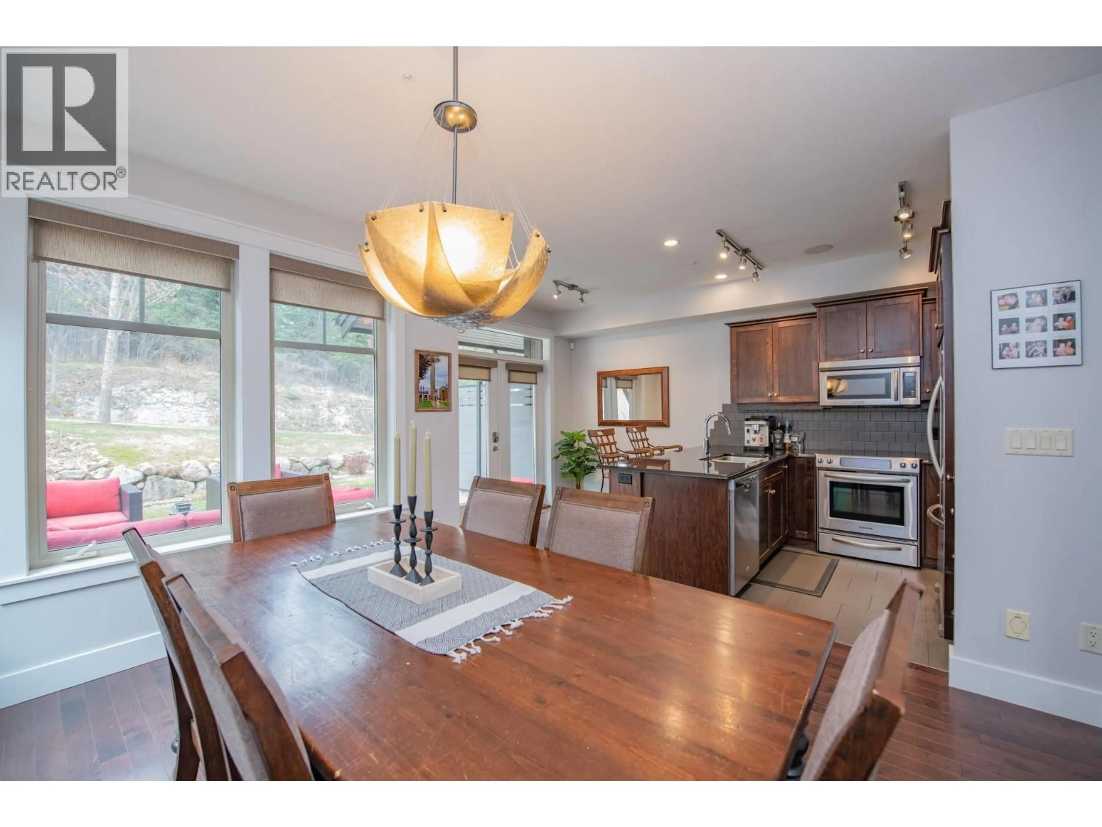 Open concept kitchen, wood/laminate floor for 30 - 333 LONGSPOON DRIVE, Vernon British Columbia V1H2L1