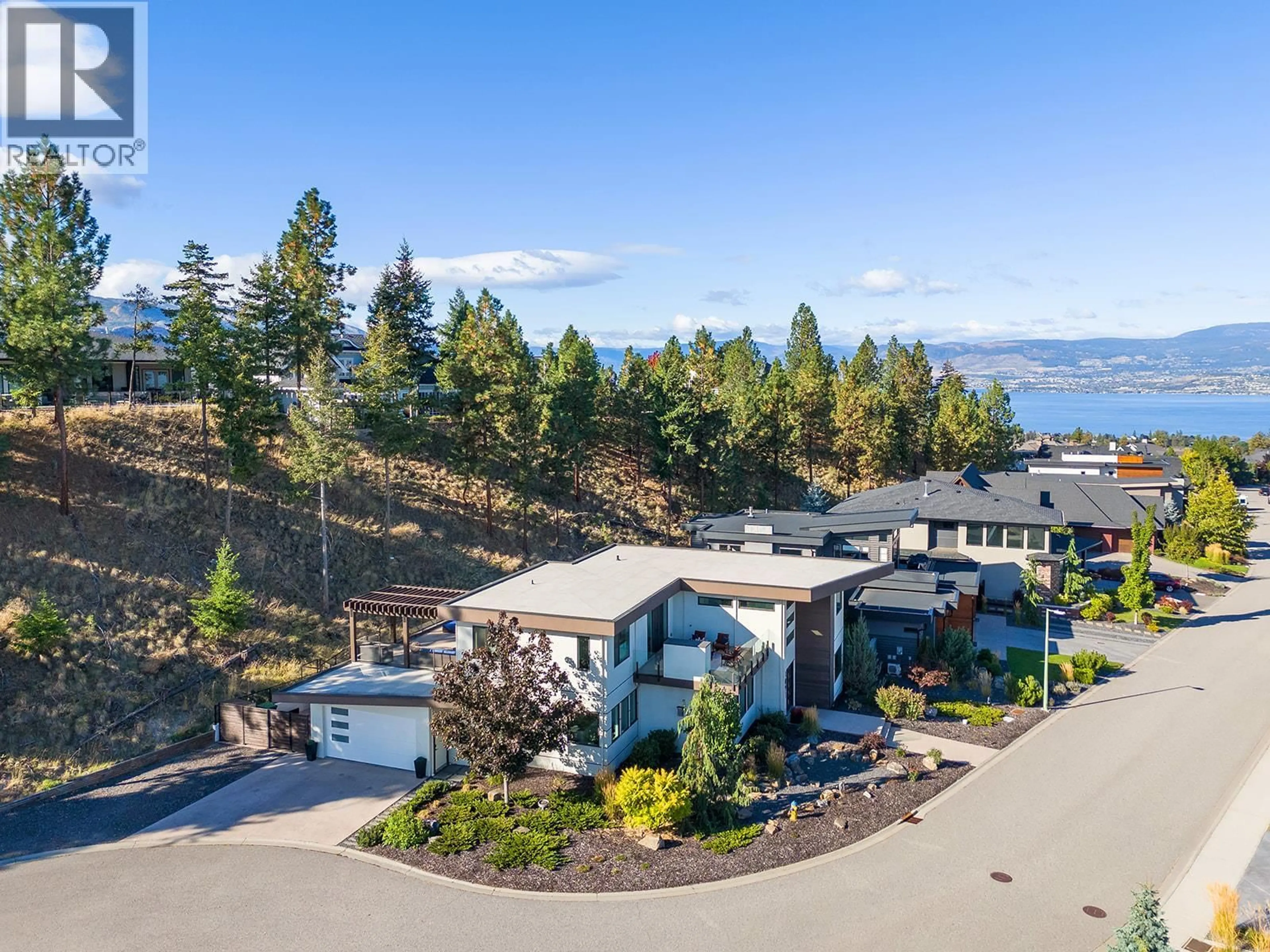 A pic from outside/outdoor area/front of a property/back of a property/a pic from drone, water/lake/river/ocean view for 1091 WESTPOINT DRIVE, Kelowna British Columbia V1W4Z9