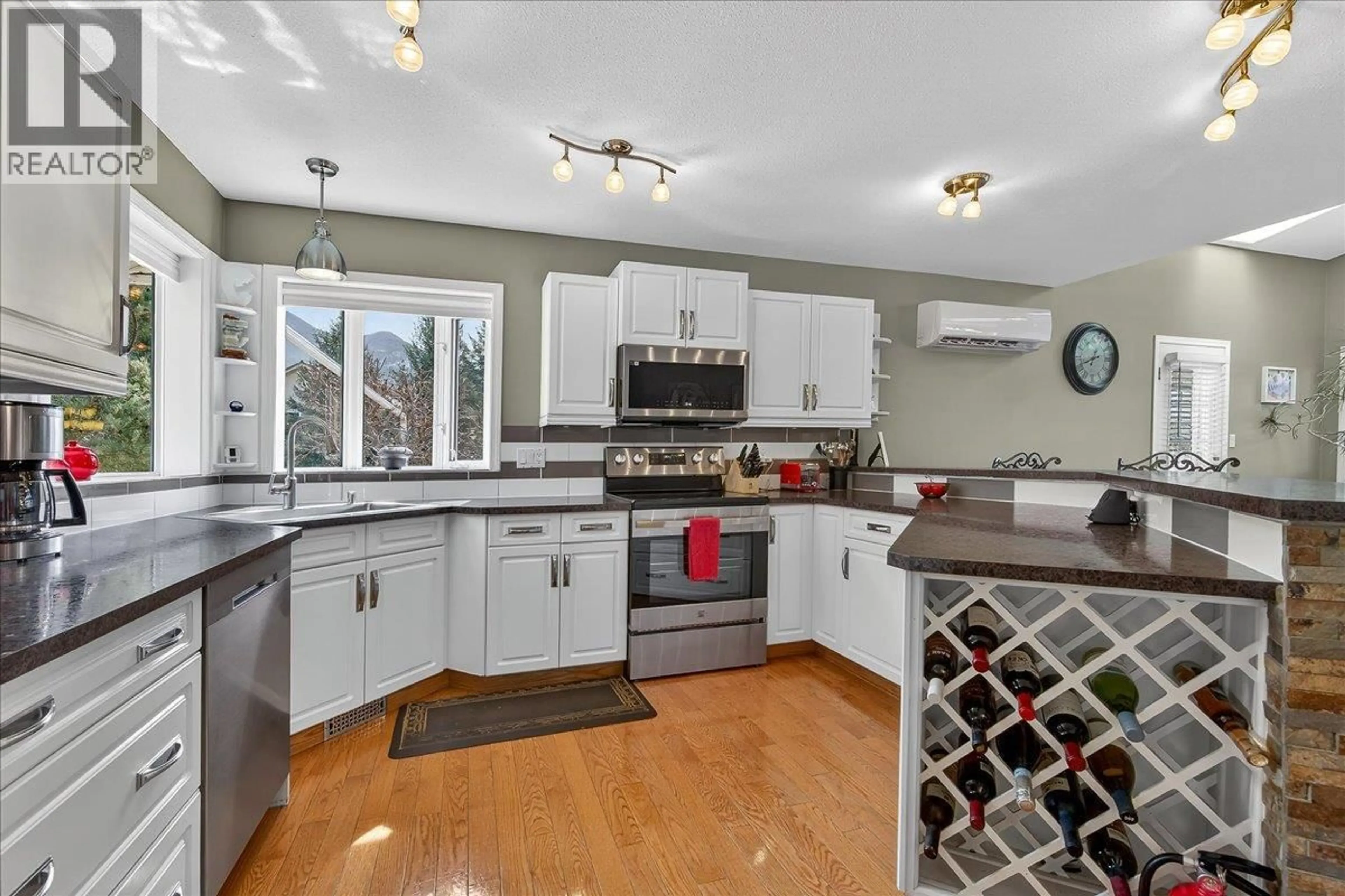 Open concept kitchen, ceramic/tile floor for 4885 CARNOUSTIE PLACE, Fairmont Hot Springs British Columbia V0B1L1