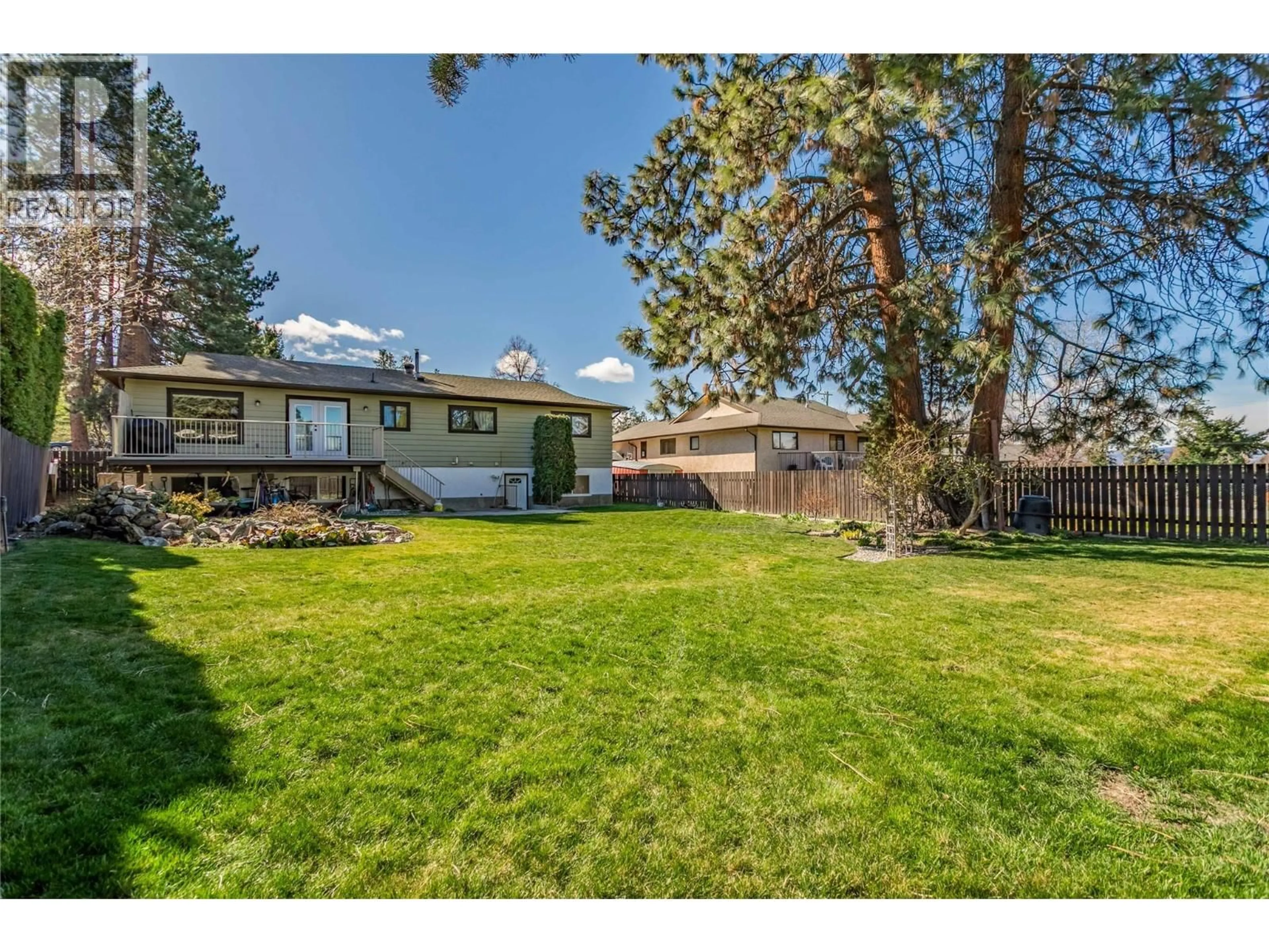 A pic from outside/outdoor area/front of a property/back of a property/a pic from drone, mountain view for 2418 FAIRHALL ROAD, Kelowna British Columbia V1W2W2