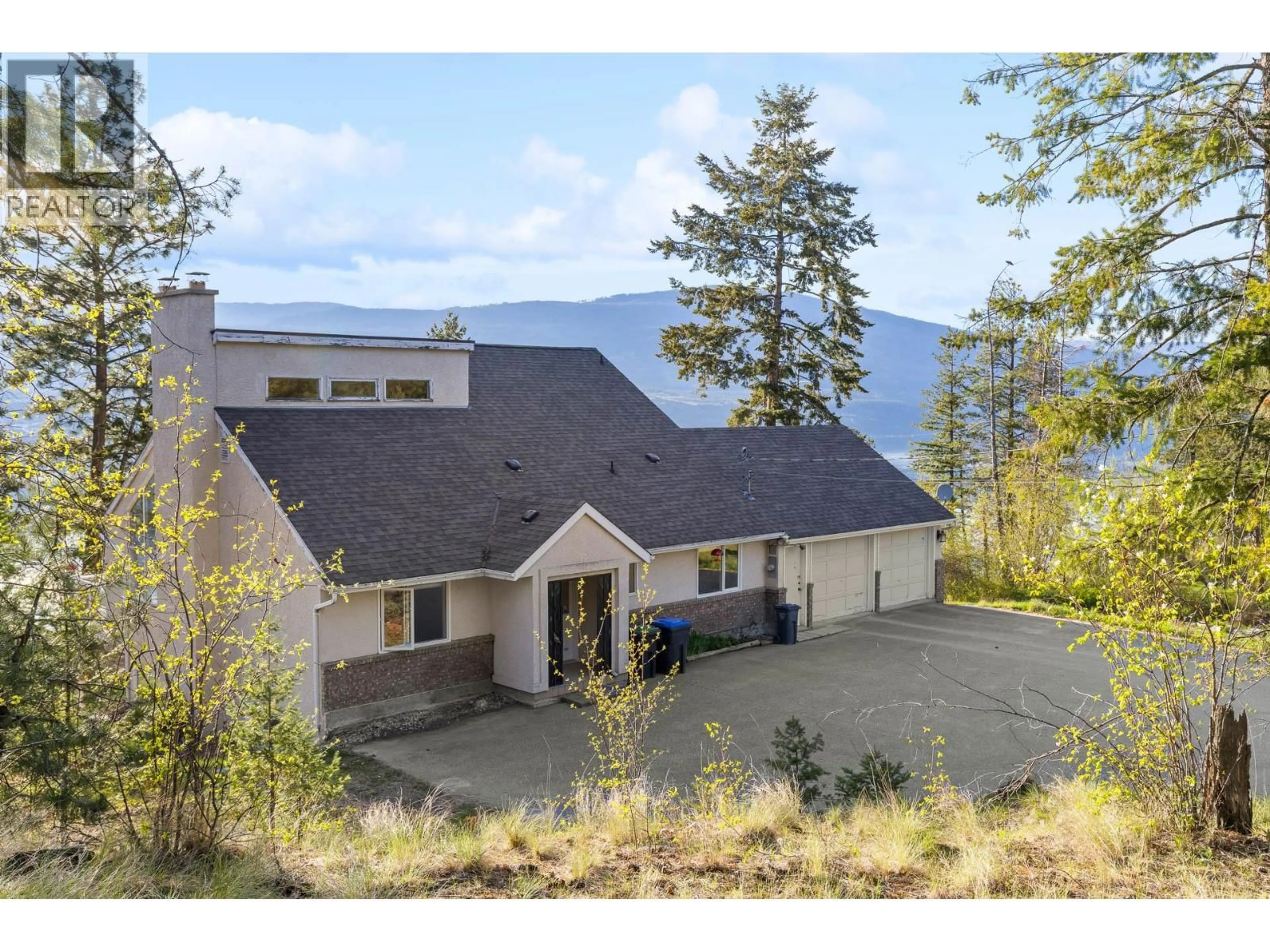 A pic from outside/outdoor area/front of a property/back of a property/a pic from drone, mountain view for 15524 BARKLEY ROAD, Lake Country British Columbia V4V1B4
