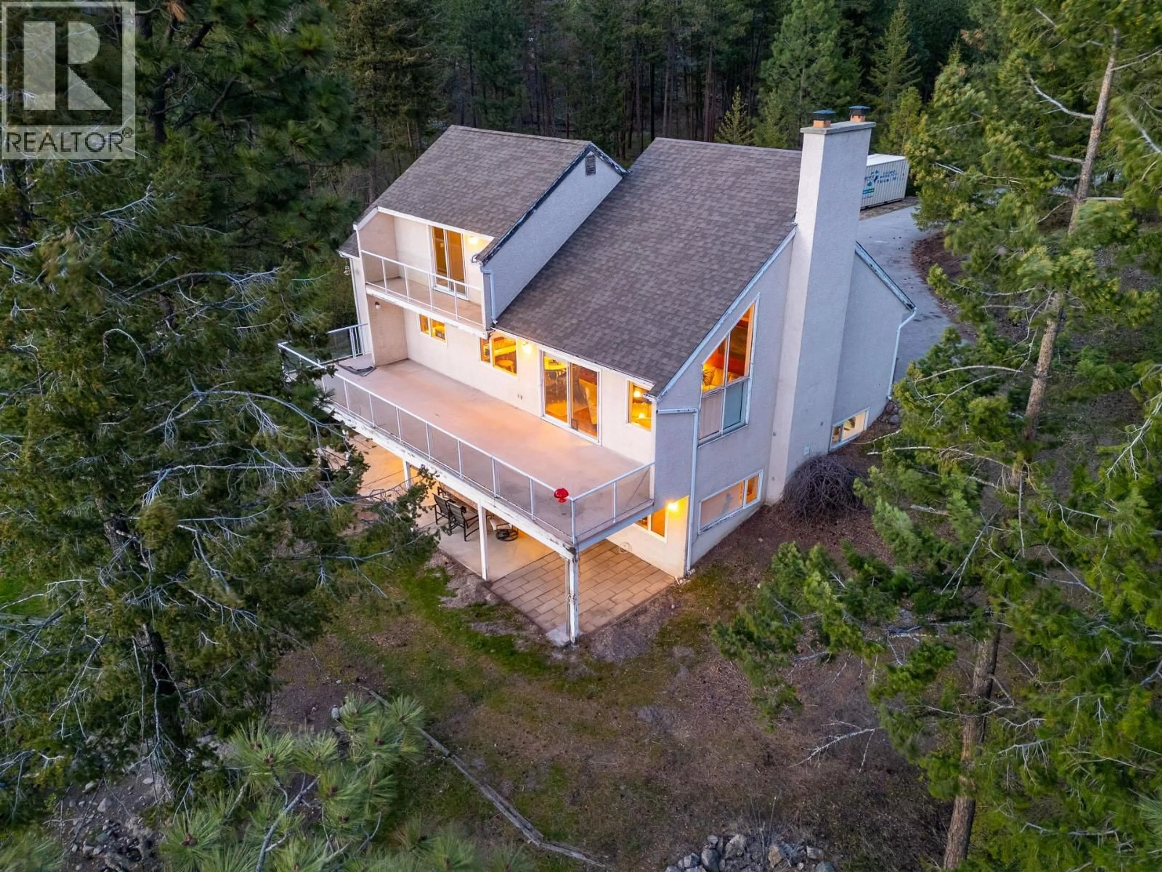 A pic from outside/outdoor area/front of a property/back of a property/a pic from drone, forest/trees view for 15524 BARKLEY ROAD, Lake Country British Columbia V4V1B4
