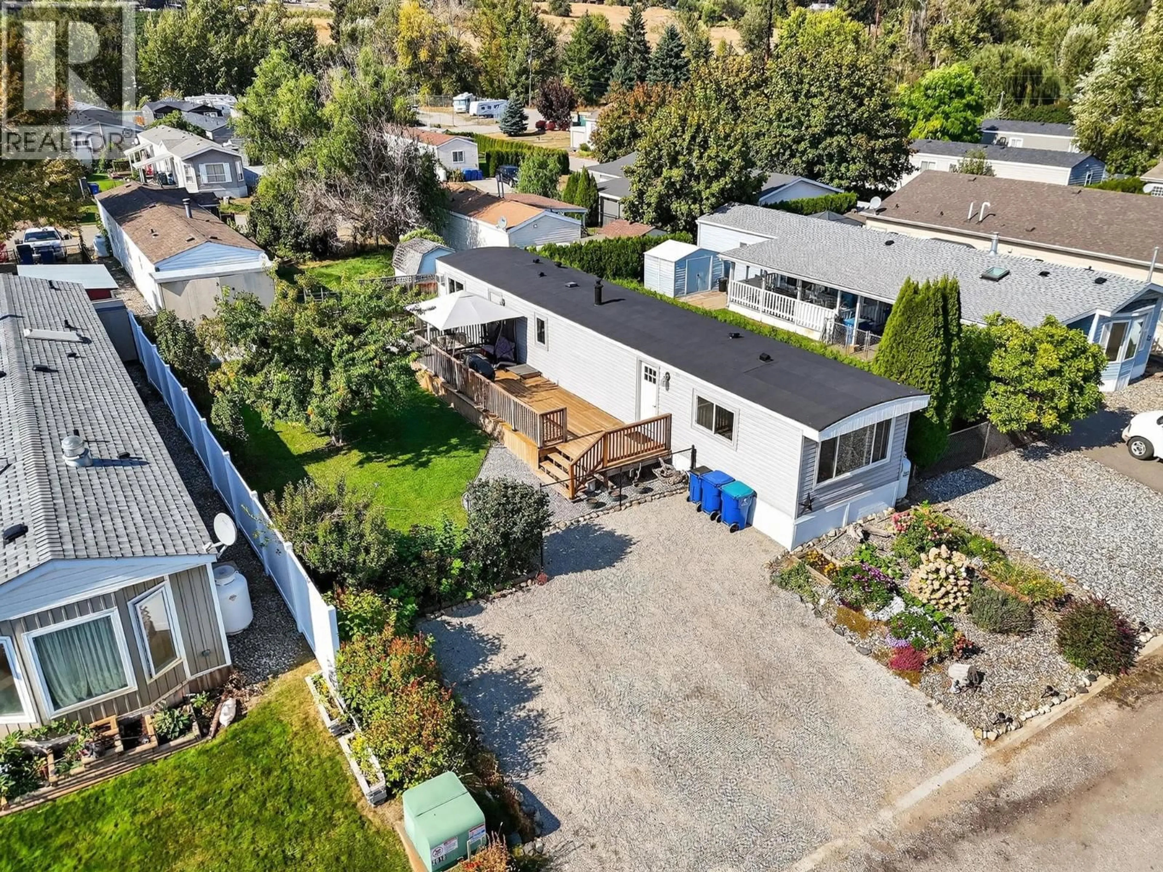 A pic from outside/outdoor area/front of a property/back of a property/a pic from drone, street for 34 - 8945 HWY 97N OTHER, Kelowna British Columbia V4V1E8
