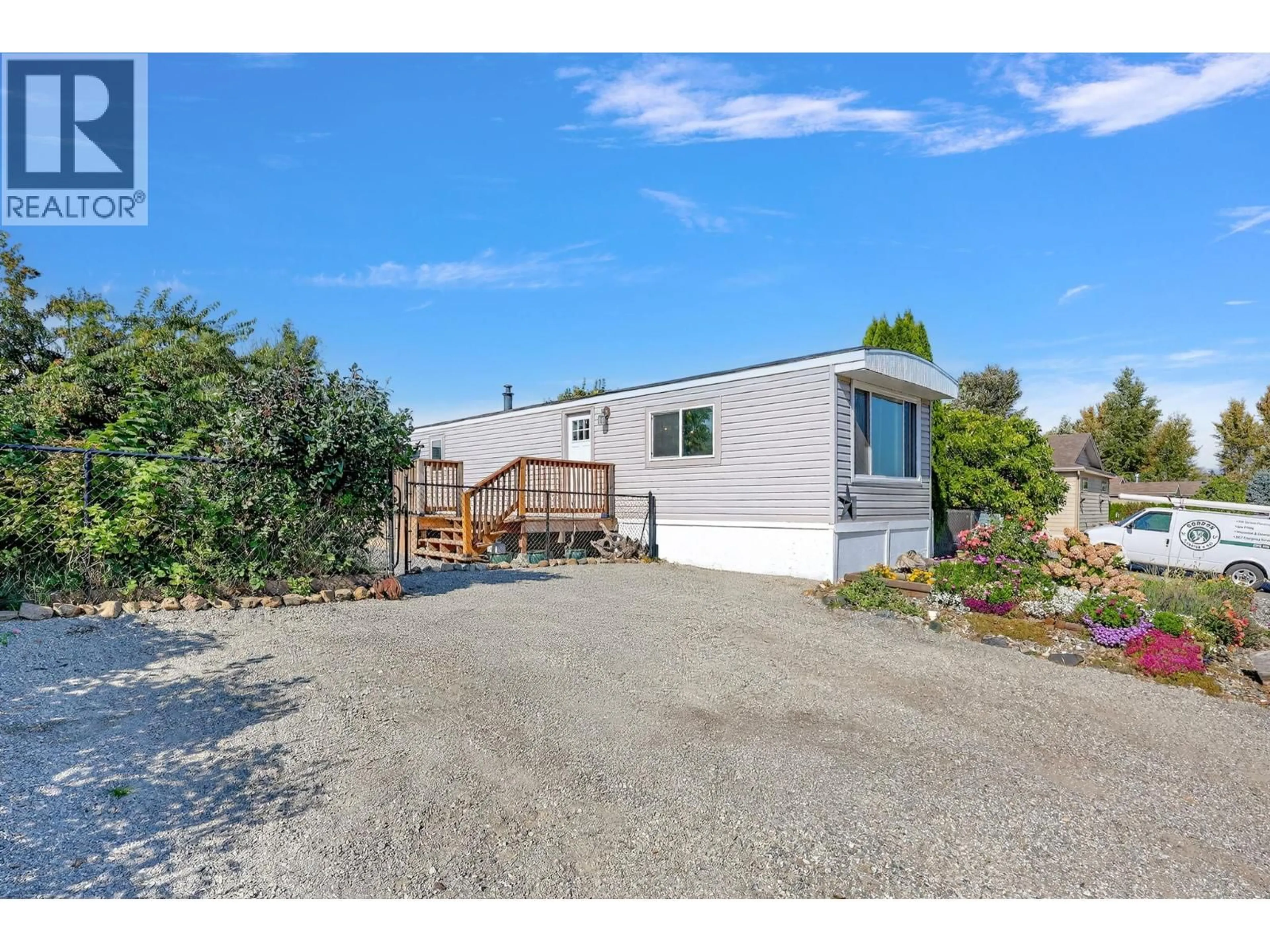 A pic from outside/outdoor area/front of a property/back of a property/a pic from drone, unknown for 34 - 8945 HWY 97N OTHER, Kelowna British Columbia V4V1E8