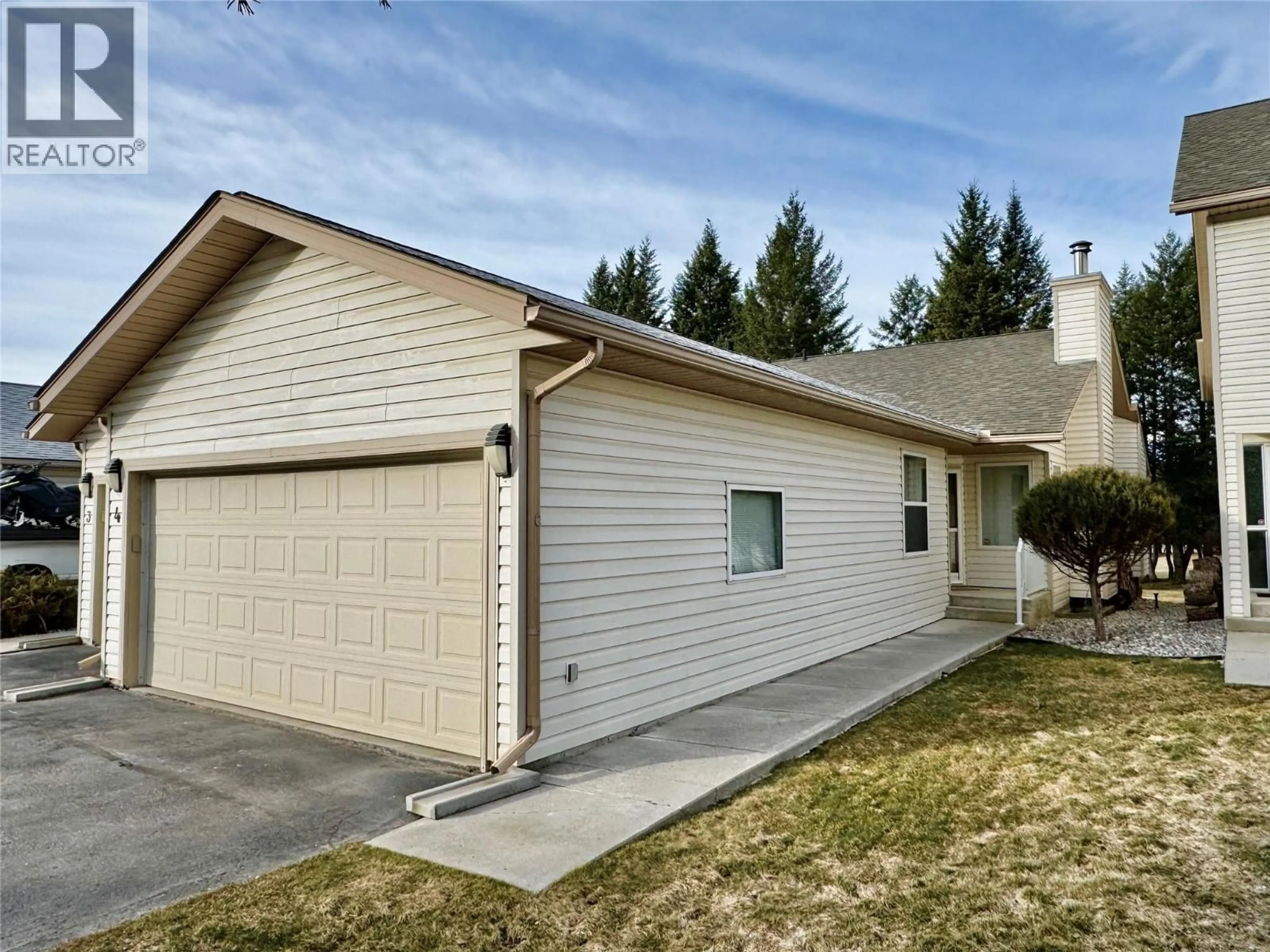 Home with vinyl exterior material, street for 4 - 7559 COLUMBIA AVENUE, Radium Hot Springs British Columbia V0A1M0