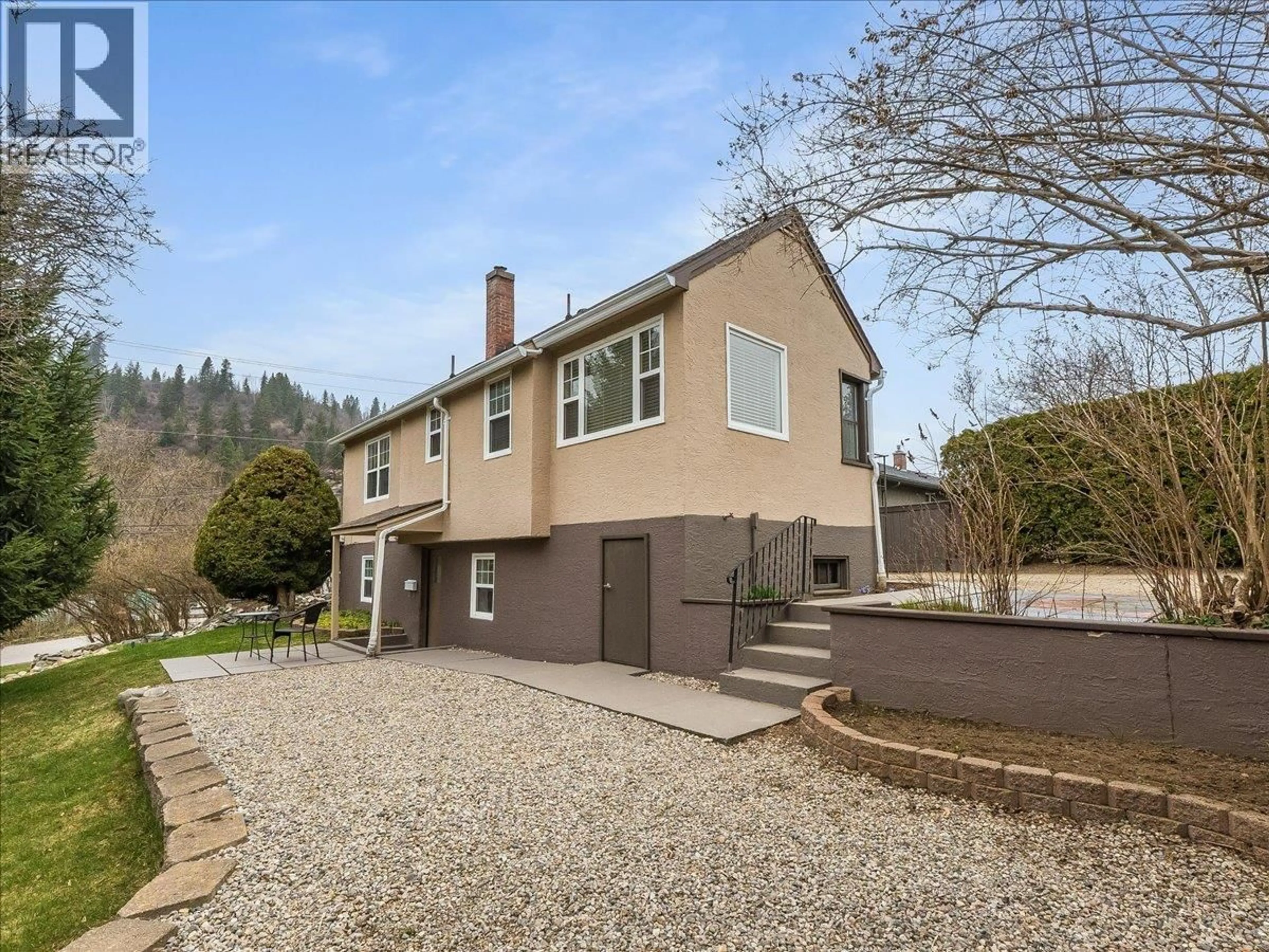 Home with brick exterior material, street for 1115 7TH AVENUE, Castlegar British Columbia V1N1S5