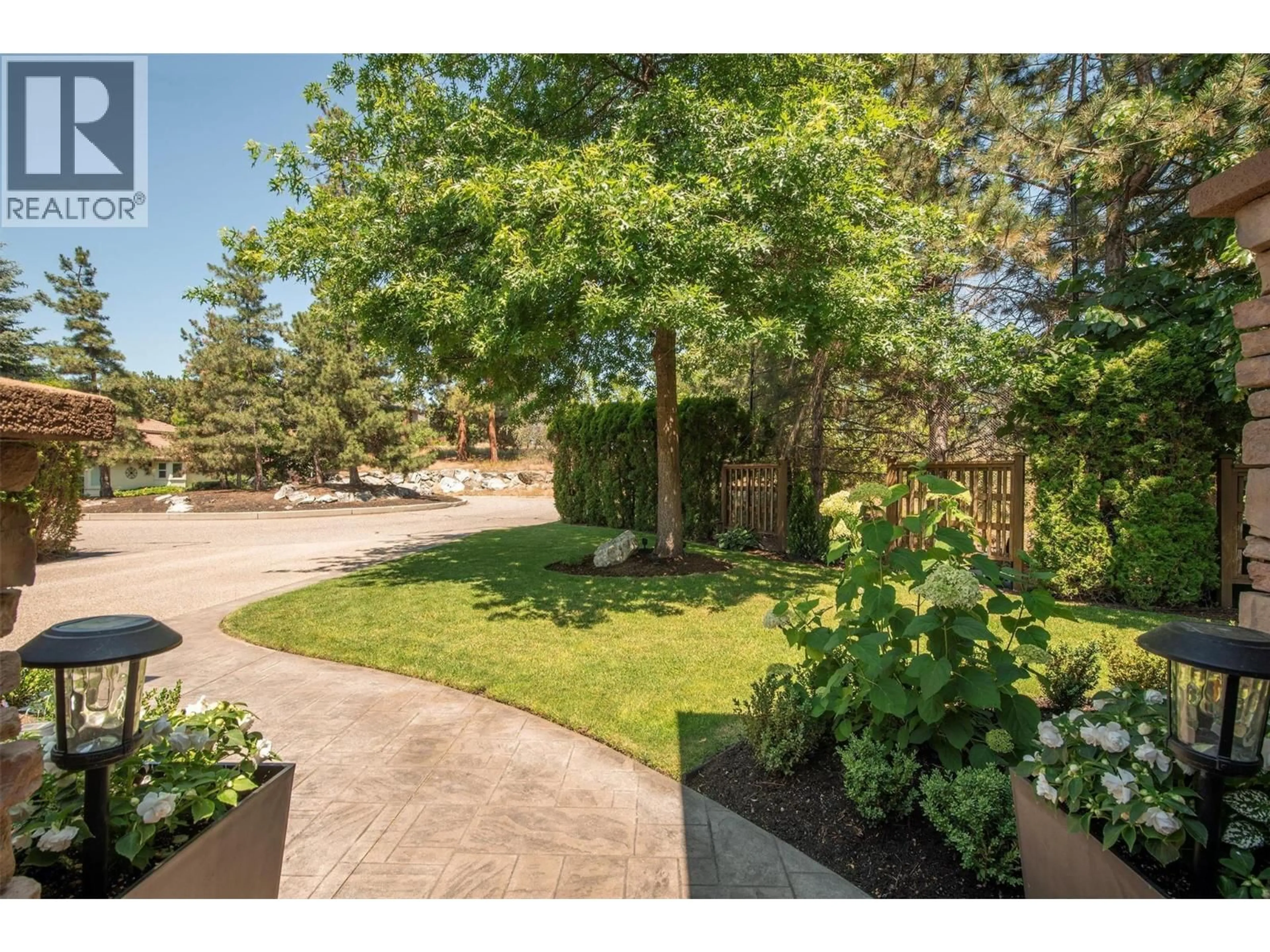 A pic from outside/outdoor area/front of a property/back of a property/a pic from drone, street for 4048 GALLAGHERS TERRACE, Kelowna British Columbia V1W3Z8