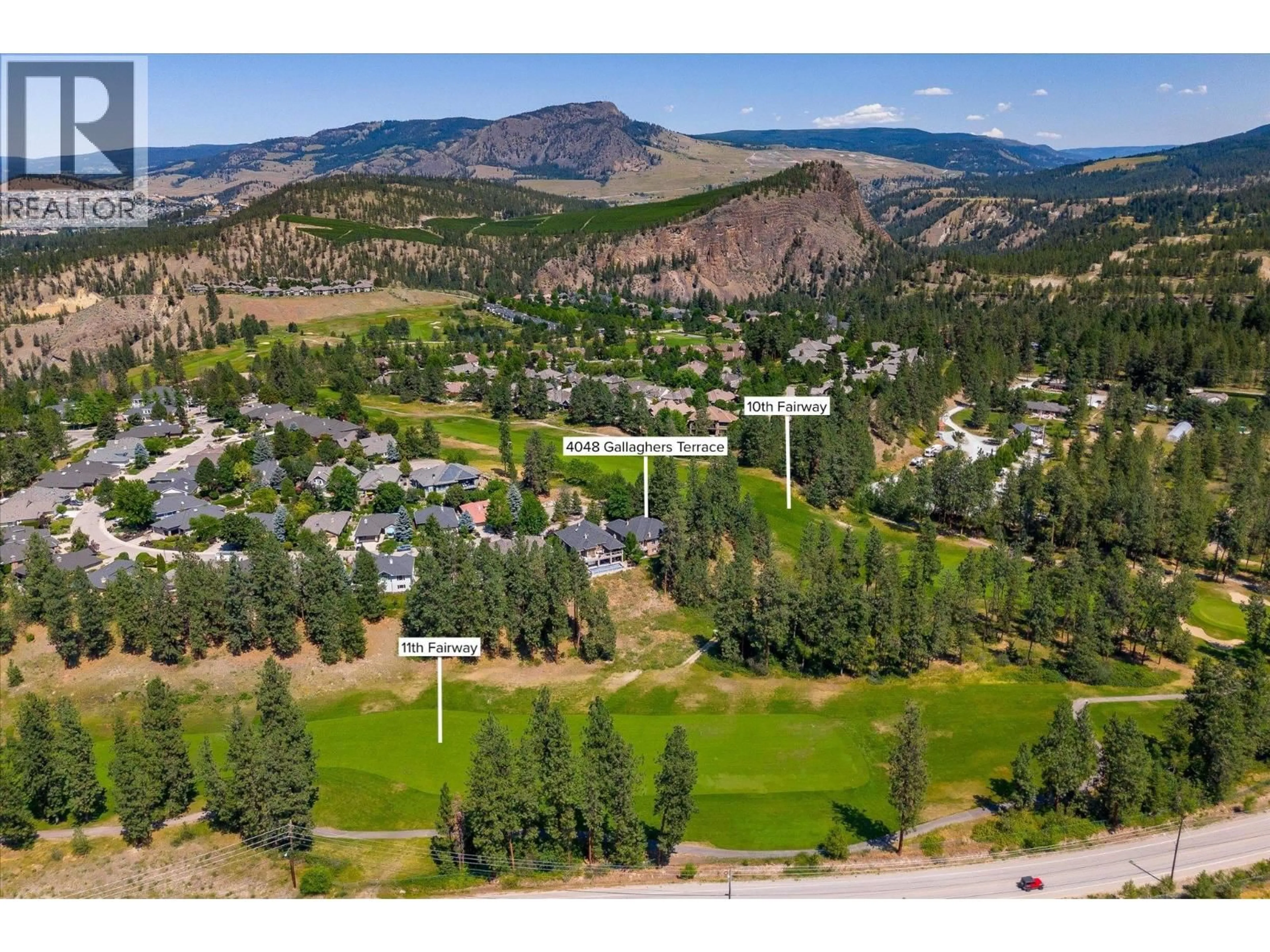 A pic from outside/outdoor area/front of a property/back of a property/a pic from drone, mountain view for 4048 GALLAGHERS TERRACE, Kelowna British Columbia V1W3Z8
