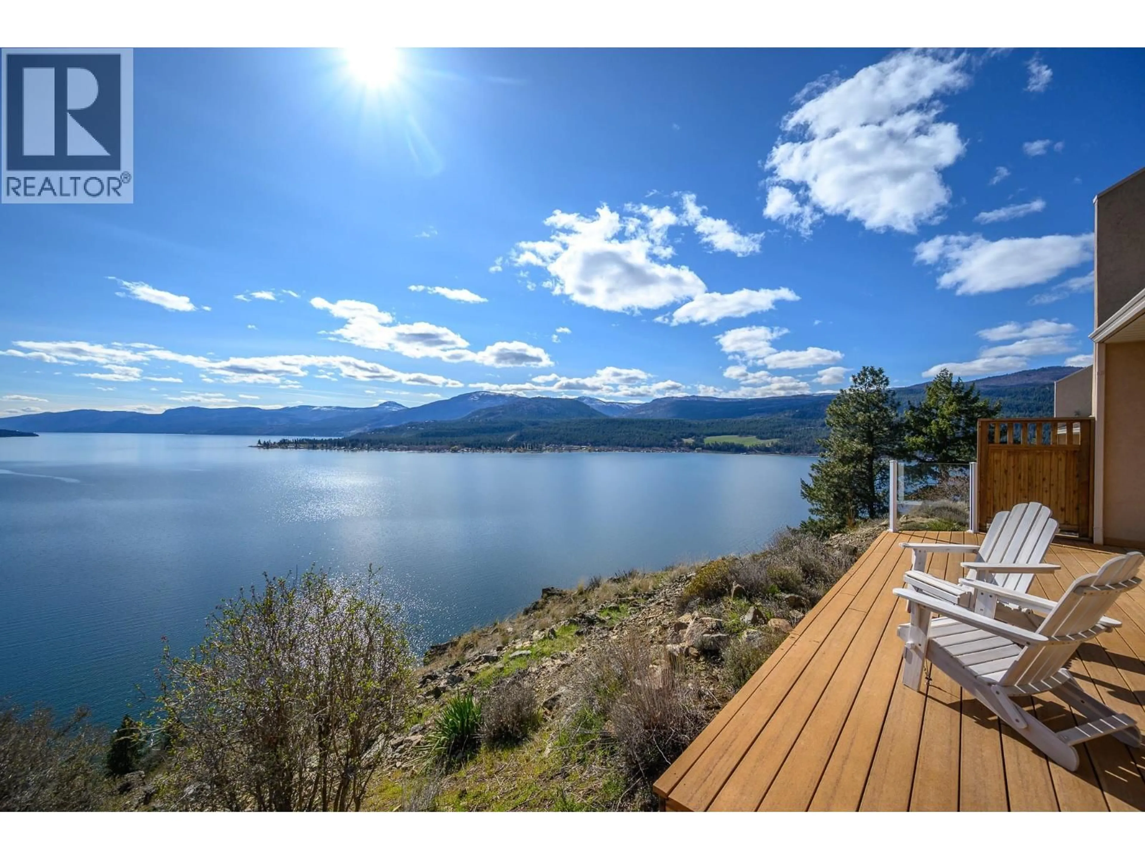 A pic from outside/outdoor area/front of a property/back of a property/a pic from drone, water/lake/river/ocean view for 1 - 83 PEREGRINE WAY, Vernon British Columbia V1H1E9