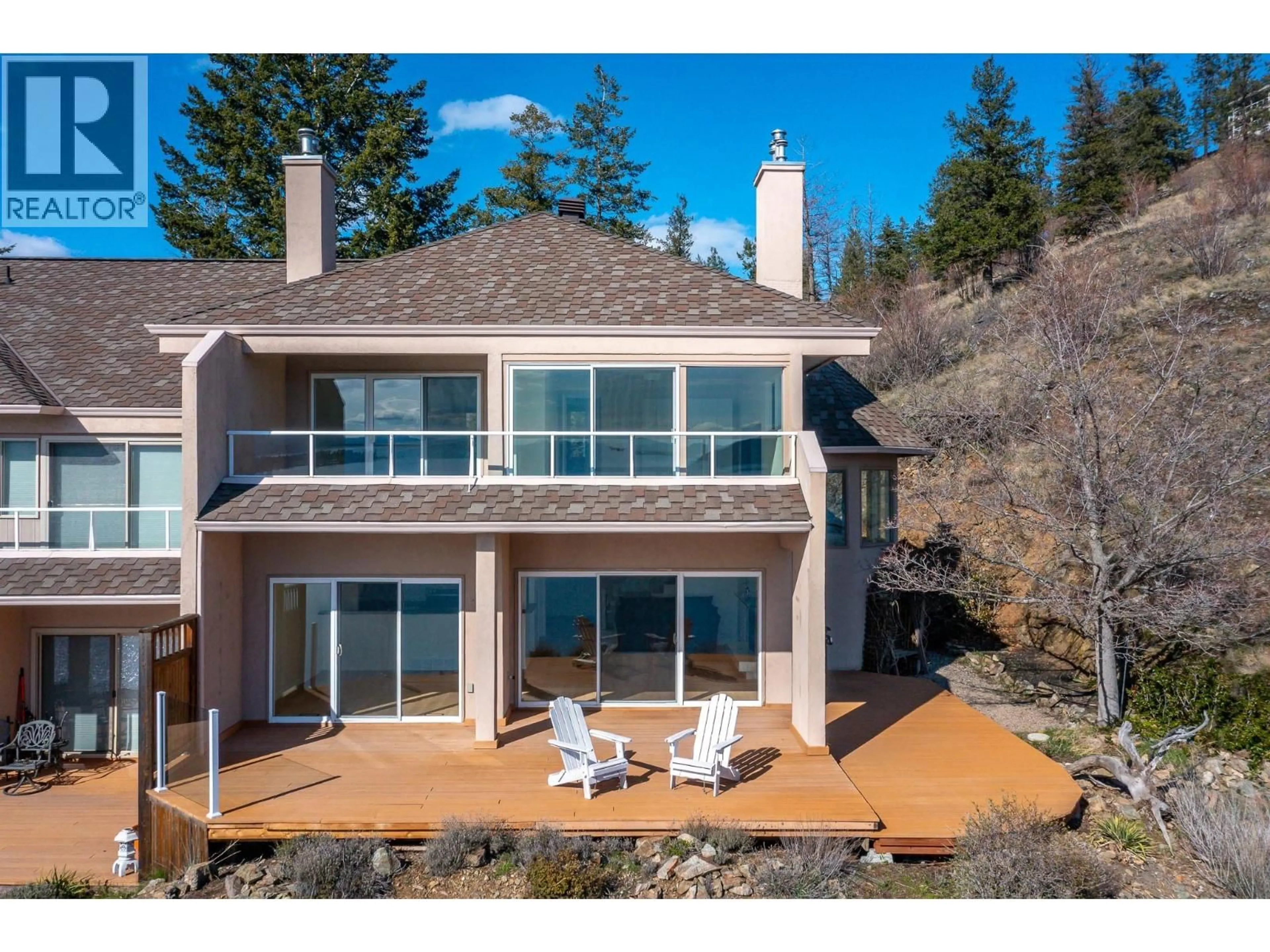 A pic from outside/outdoor area/front of a property/back of a property/a pic from drone, water/lake/river/ocean view for 1 - 83 PEREGRINE WAY, Vernon British Columbia V1H1E9