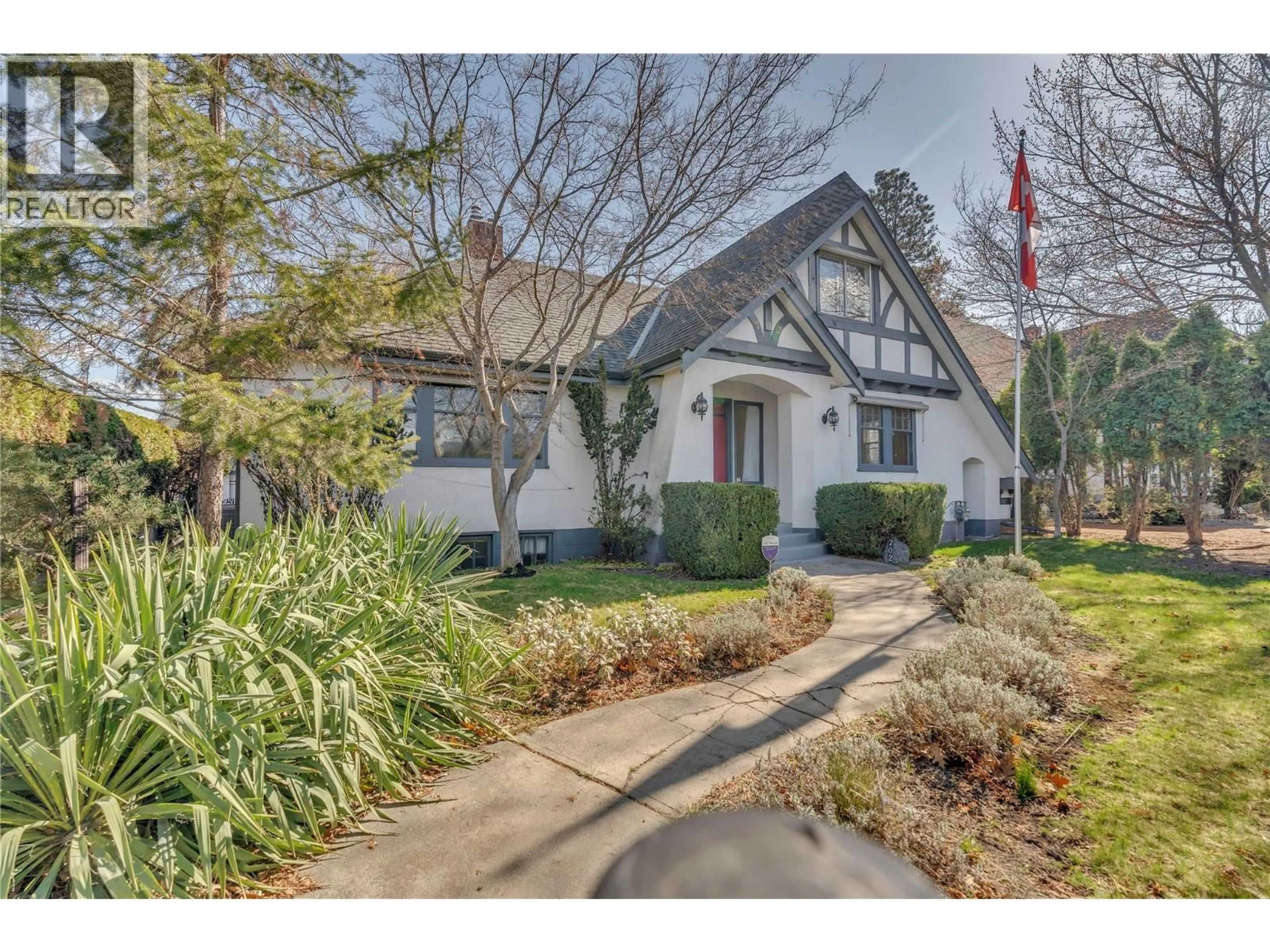 Home with brick exterior material, street for 702 WINNIPEG STREET, Penticton British Columbia V2A5N3