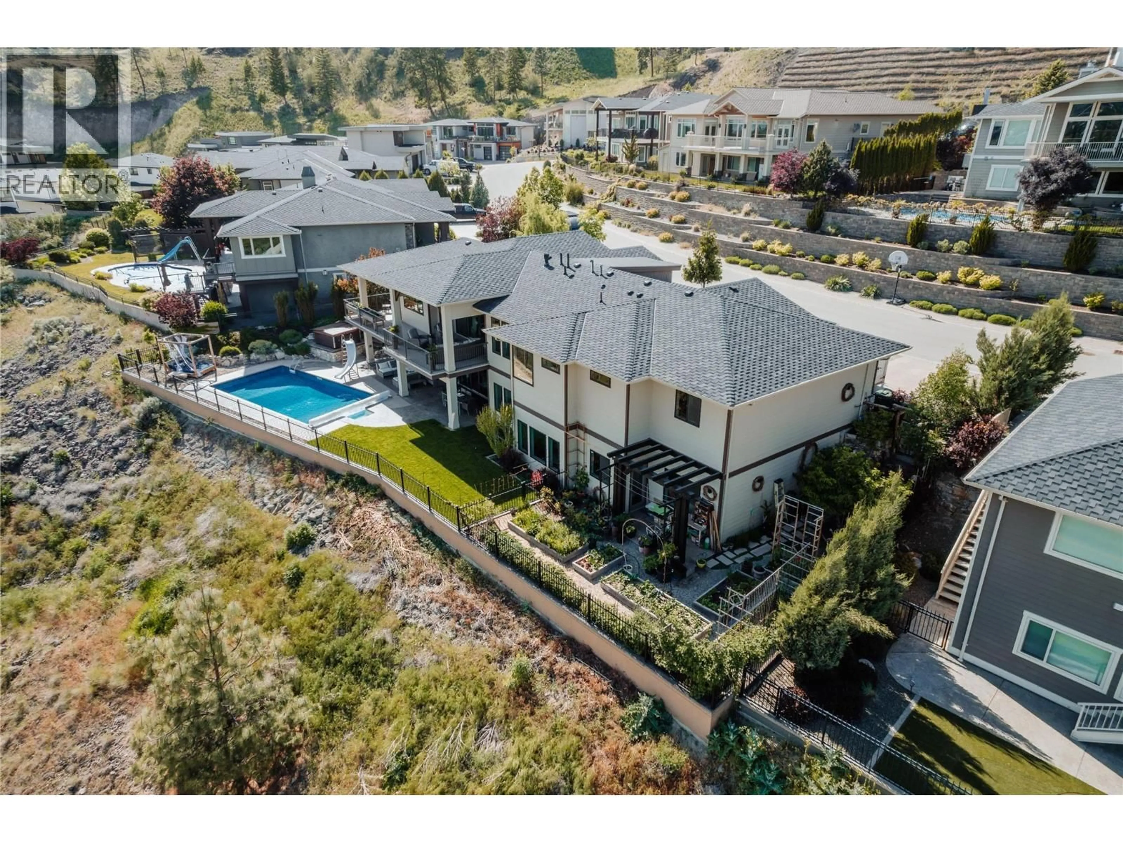 A pic from outside/outdoor area/front of a property/back of a property/a pic from drone, mountain view for 747 TRADITIONS CRESCENT, Kelowna British Columbia V1V2Y2