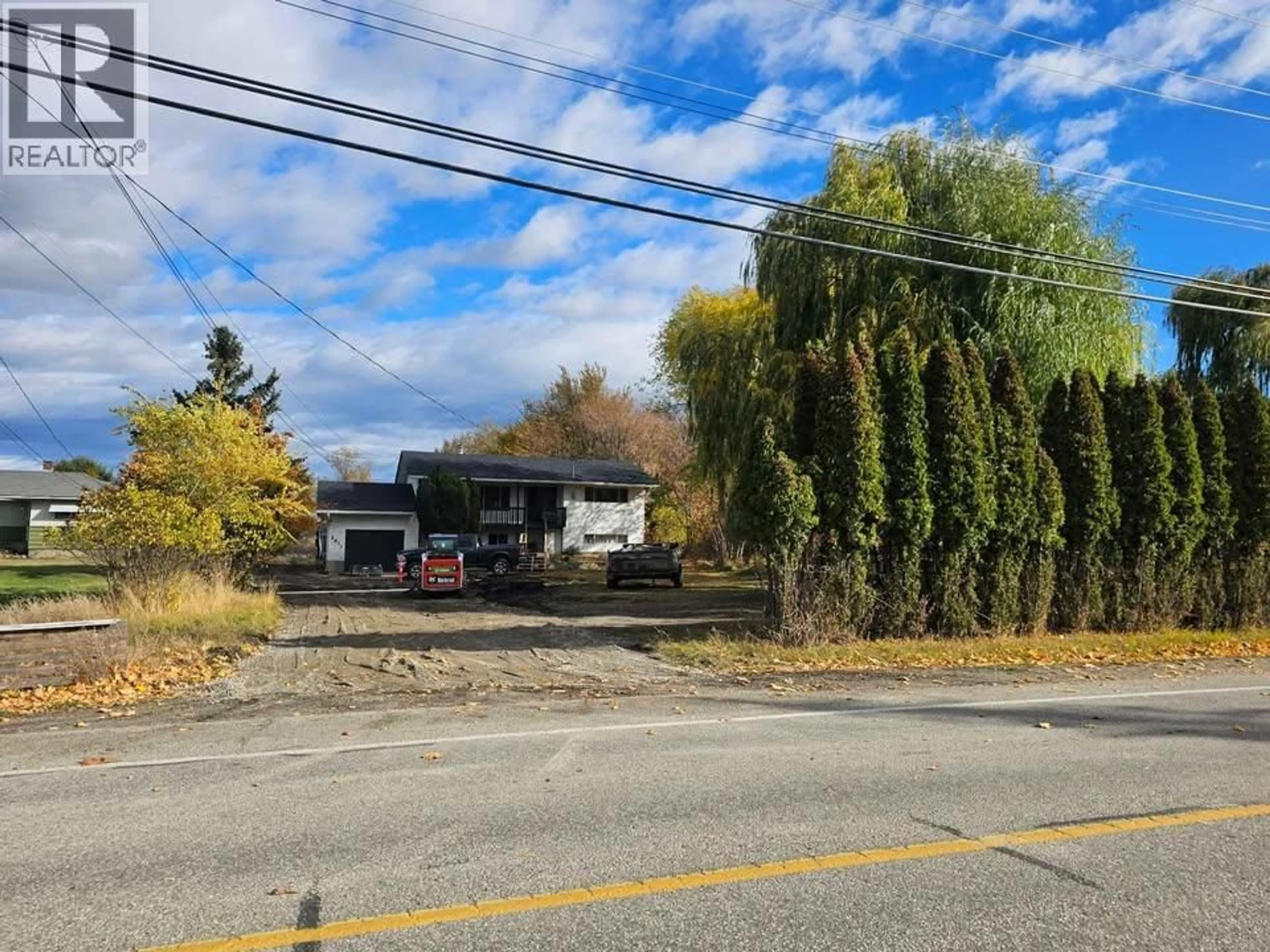 A pic from outside/outdoor area/front of a property/back of a property/a pic from drone, street for 2611 LAKESHORE ROAD, Vernon British Columbia V1H1N1