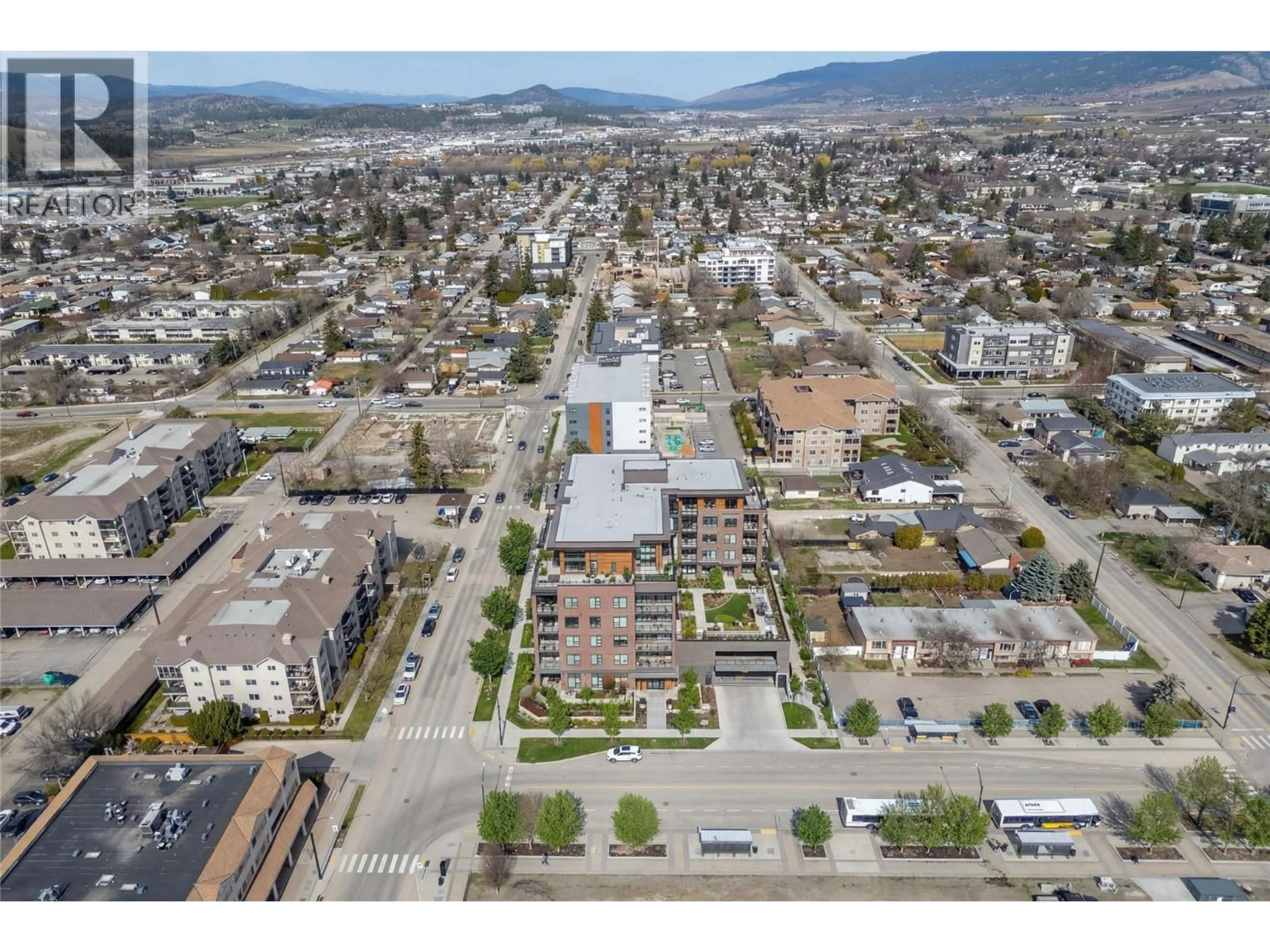 A pic from outside/outdoor area/front of a property/back of a property/a pic from drone, street for 225 DOUGALL ROAD NORTH, Kelowna British Columbia V1X3K6