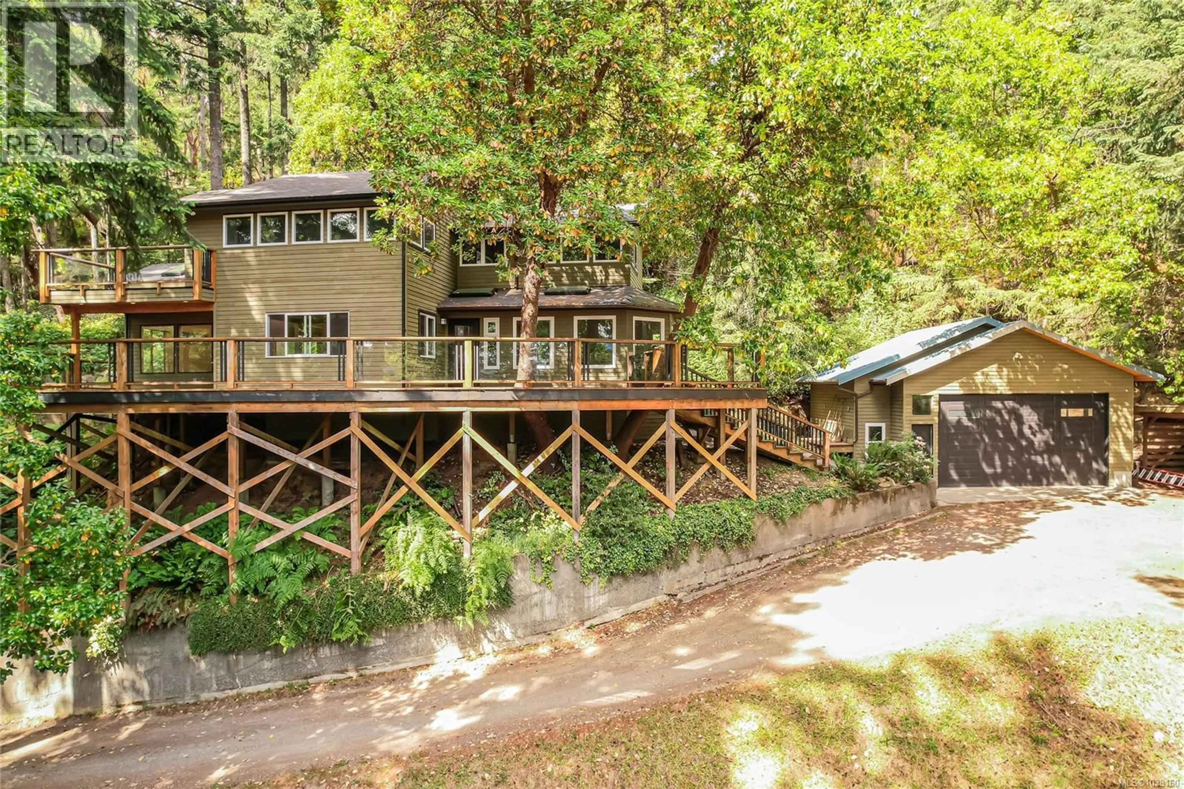 A pic from outside/outdoor area/front of a property/back of a property/a pic from drone, forest/trees view for 171 LAUTMAN DRIVE, Salt Spring British Columbia V8K2C2