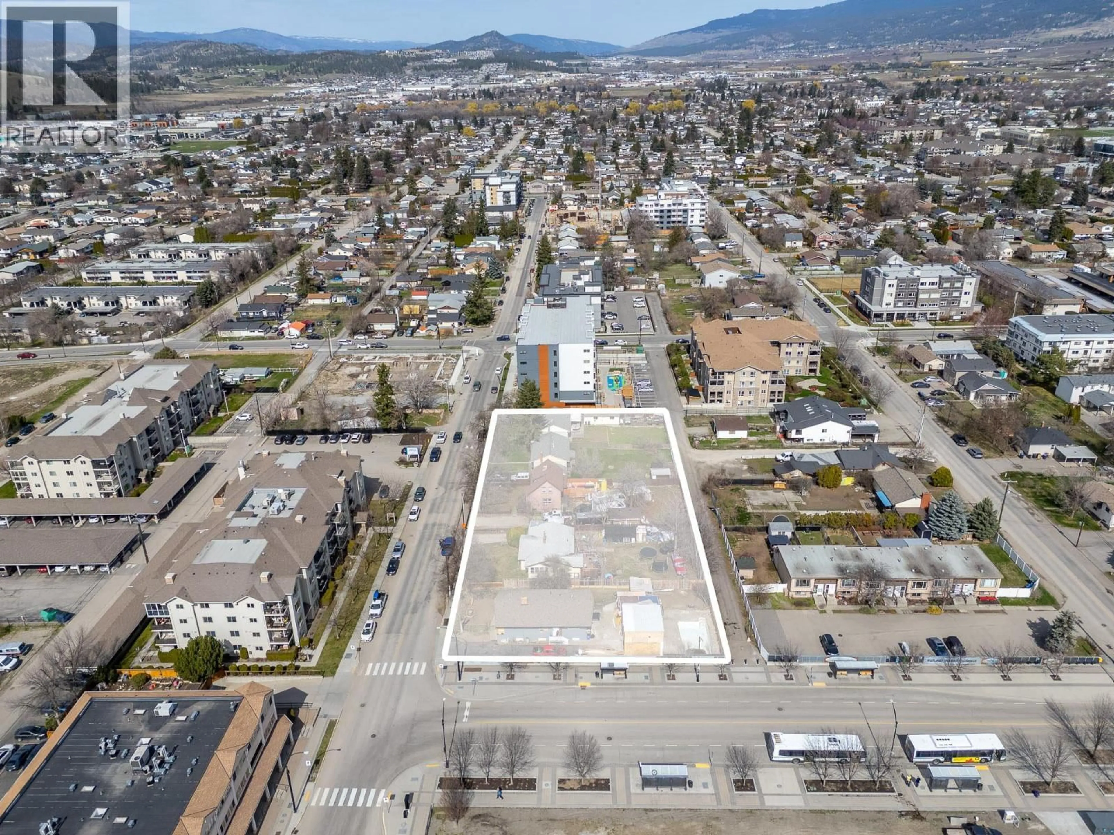 A pic from outside/outdoor area/front of a property/back of a property/a pic from drone, street for 235 DOUGALL ROAD NORTH, Kelowna British Columbia V1X3K6
