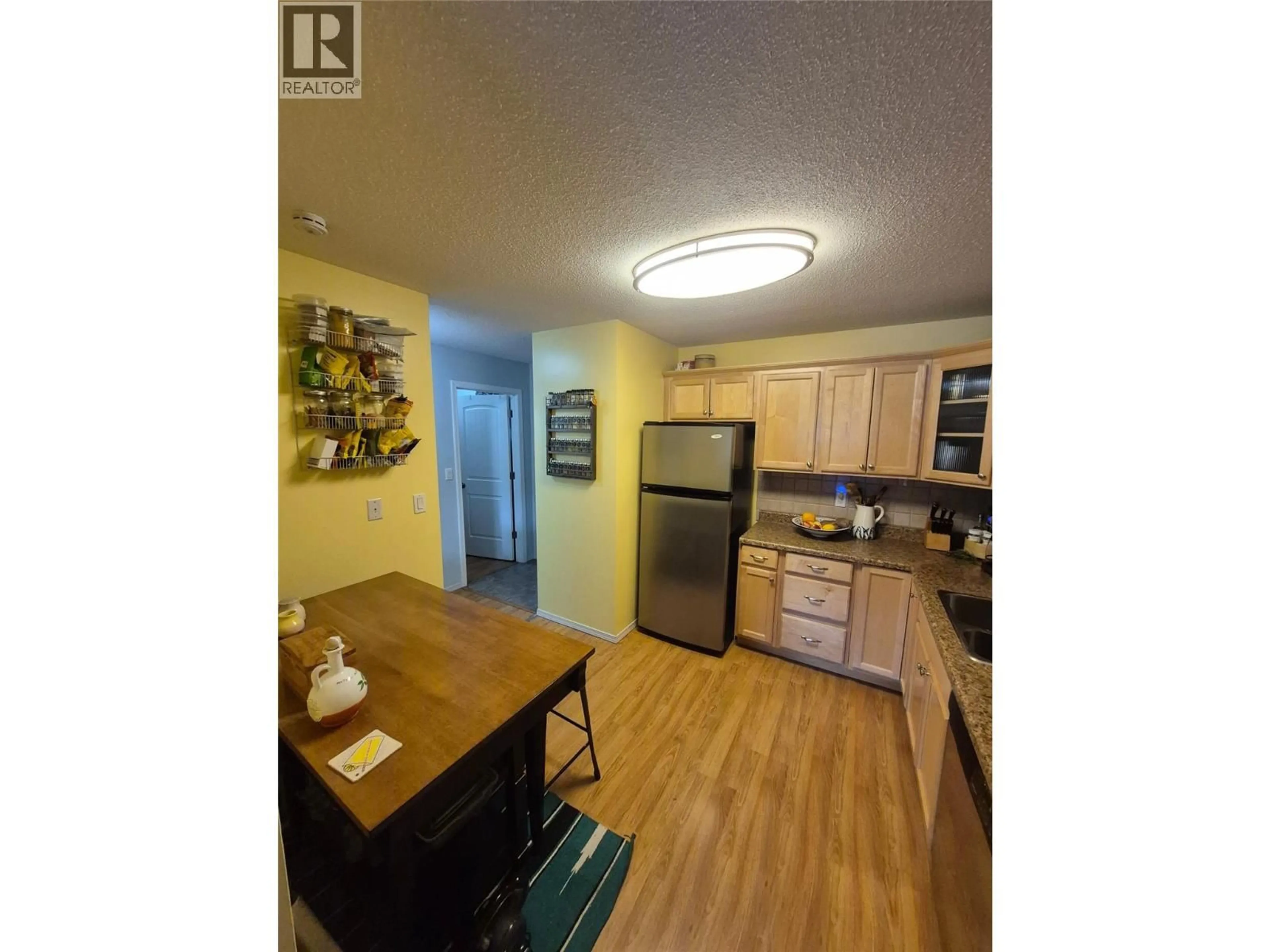 Standard kitchen, wood/laminate floor for 403 - 2126 68TH AVENUE, Grand Forks British Columbia V0H1H0