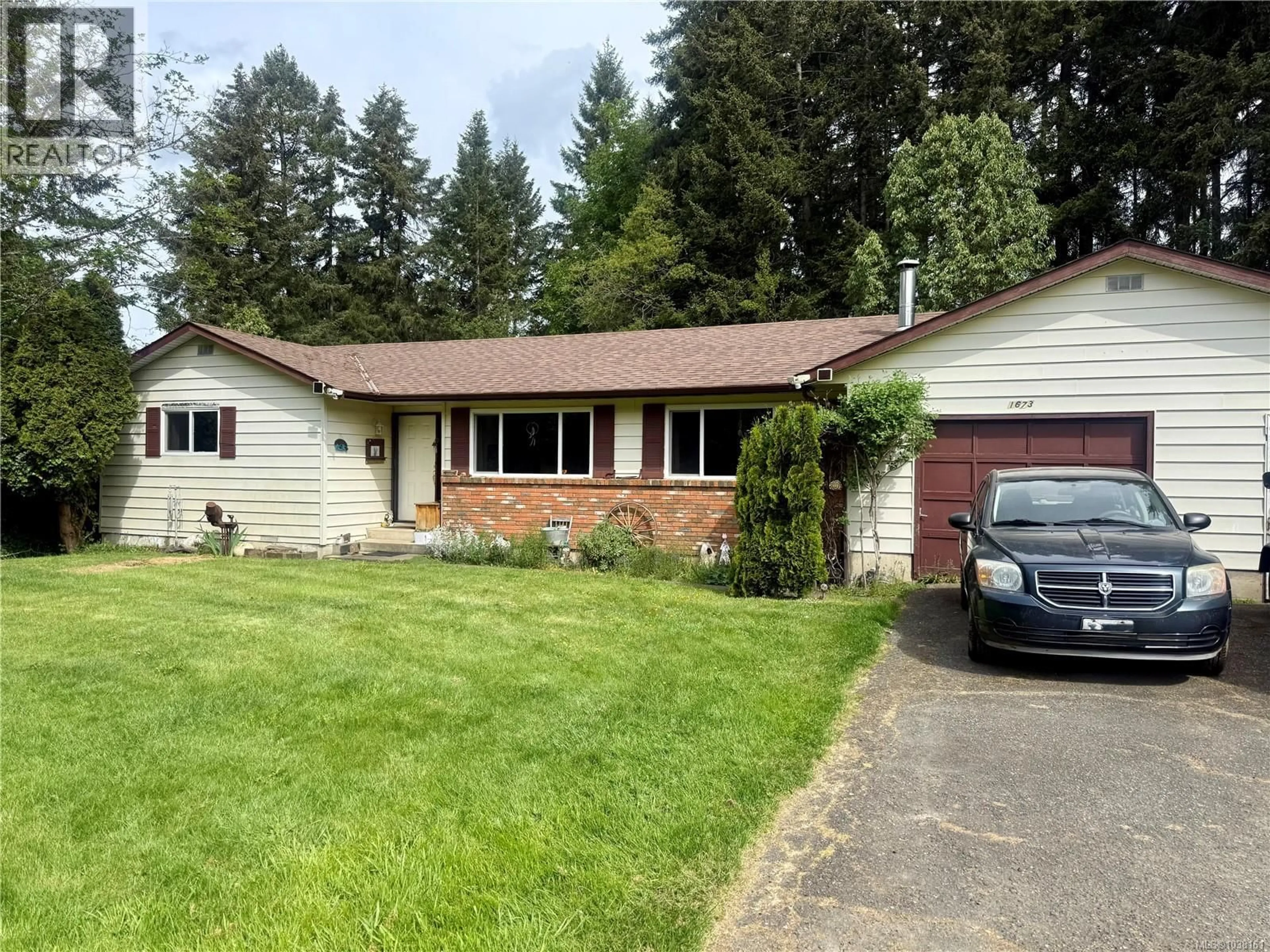 Home with vinyl exterior material, street for 1673 NORTHWEST BAY ROAD, Nanoose Bay British Columbia V9P9C4