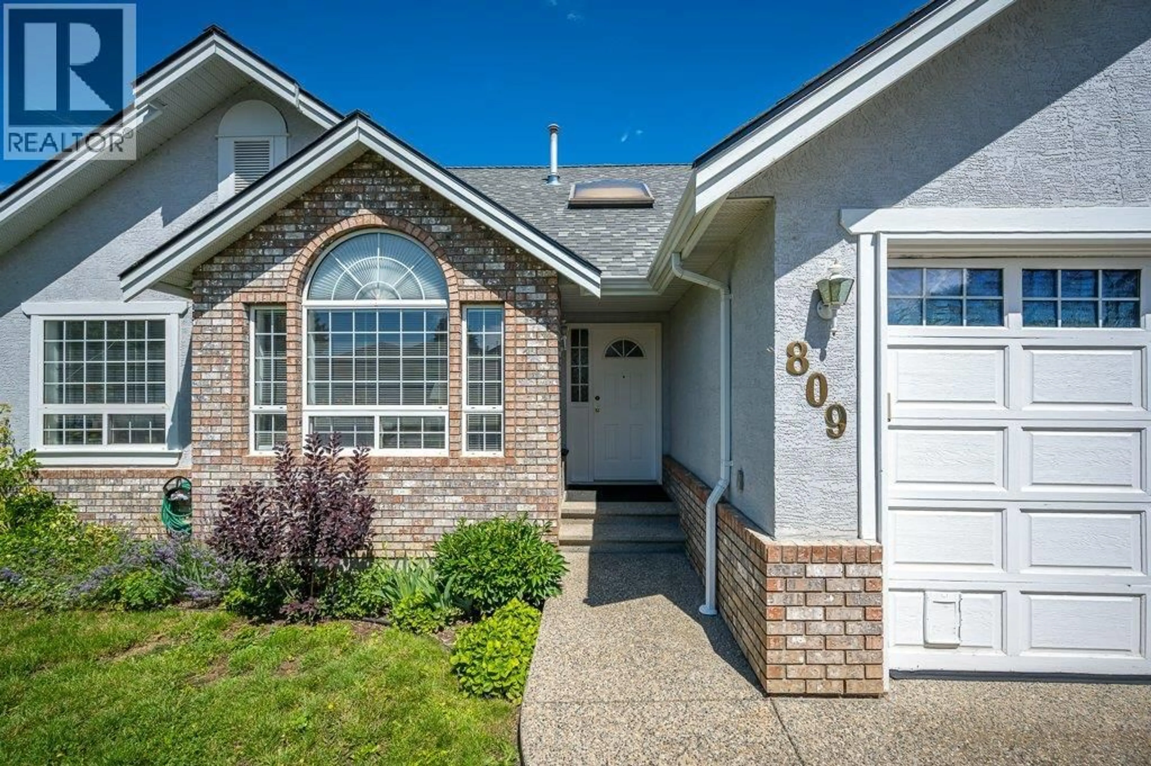 Home with vinyl exterior material, street for 809 CAVALIER DRIVE, Vernon British Columbia V1T9M6