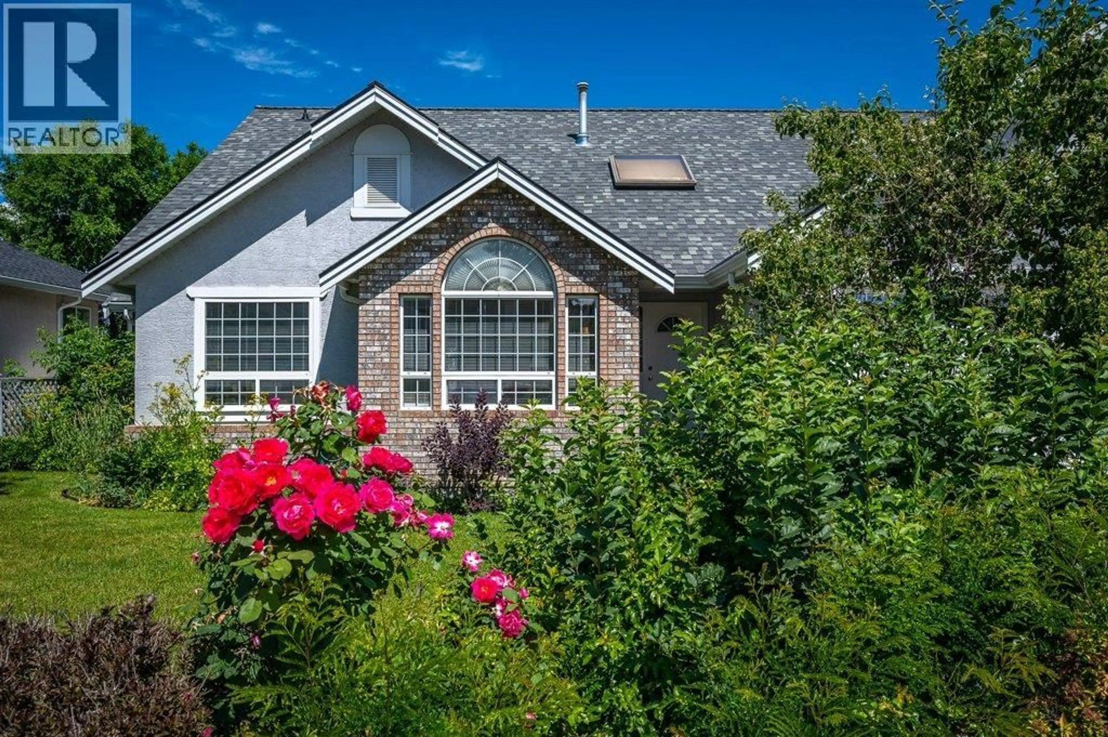 Home with brick exterior material, unknown for 809 CAVALIER DRIVE, Vernon British Columbia V1T9M6