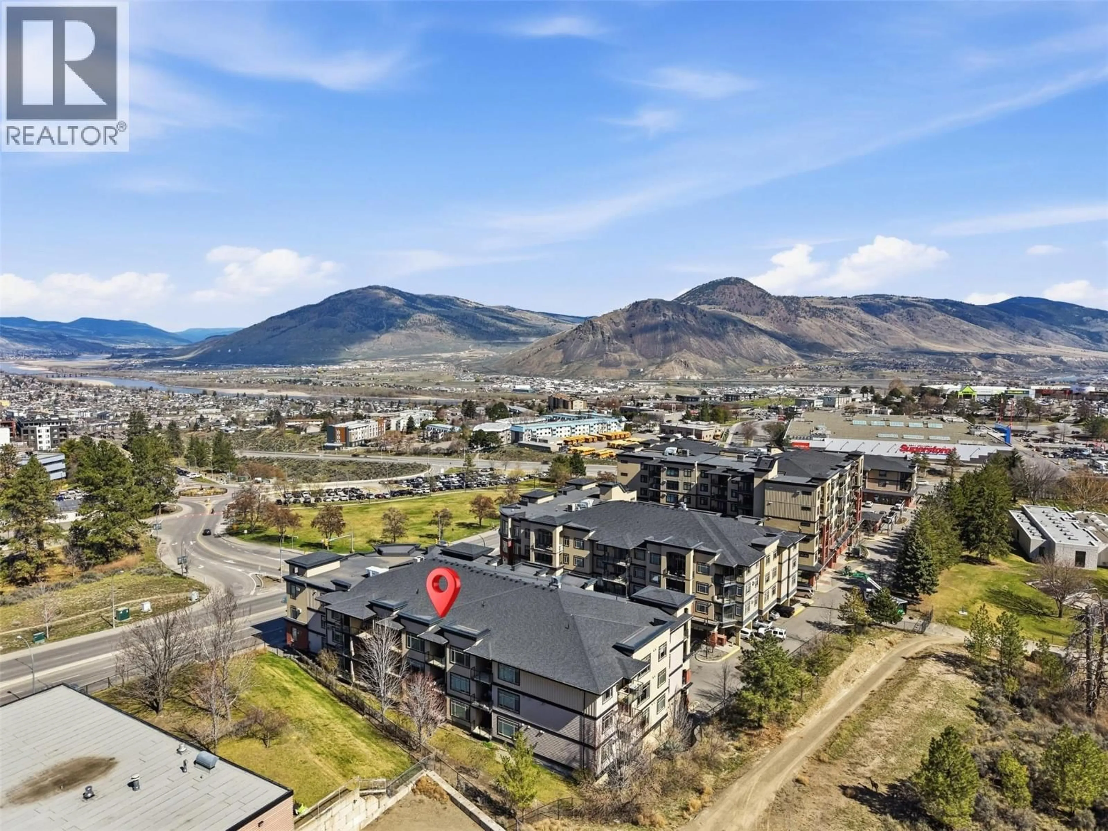 A pic from outside/outdoor area/front of a property/back of a property/a pic from drone, mountain view for 404 - 795 MCGILL ROAD, Kamloops British Columbia V2C0B9
