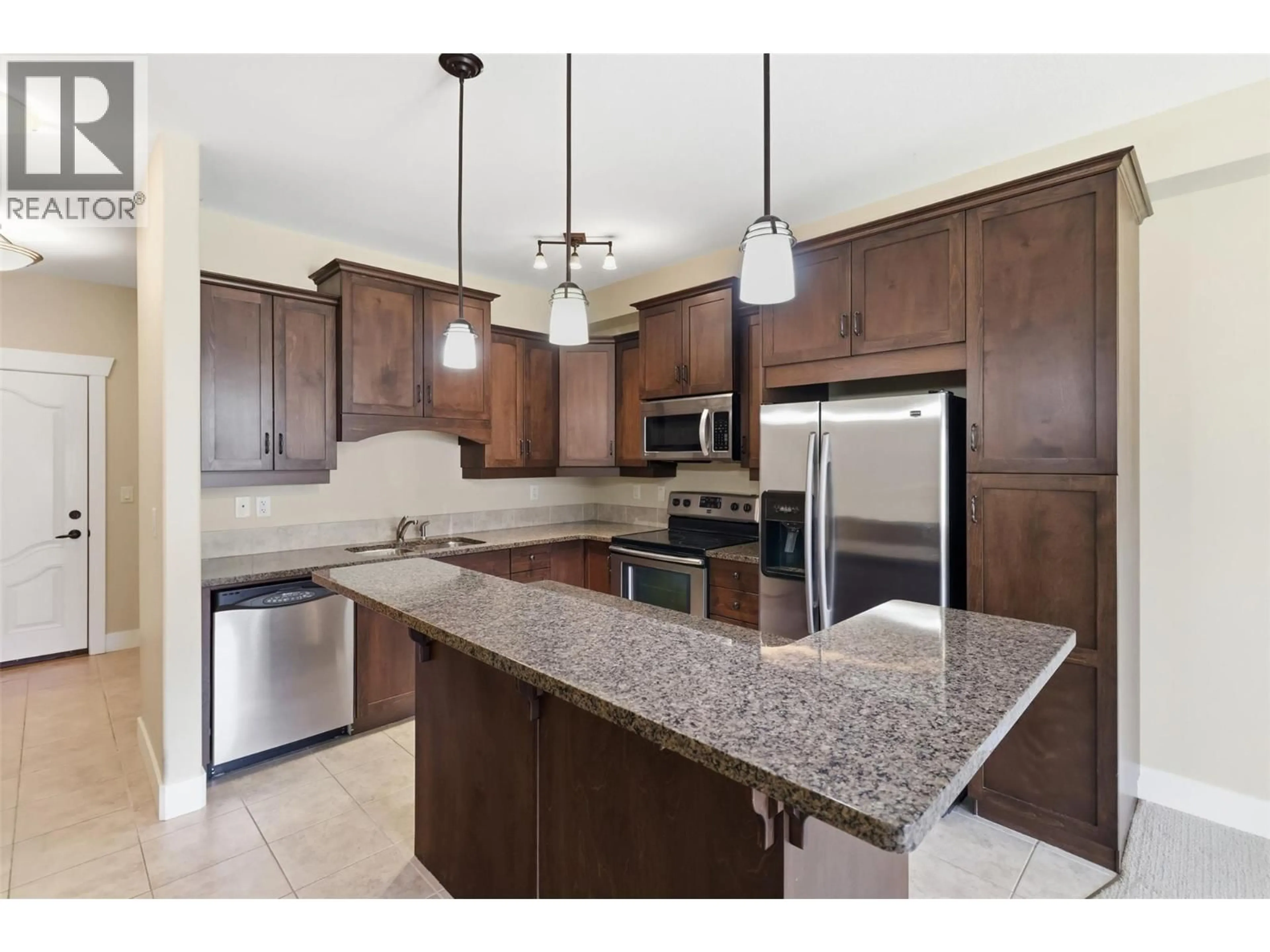 Open concept kitchen, ceramic/tile floor for 404 - 795 MCGILL ROAD, Kamloops British Columbia V2C0B9
