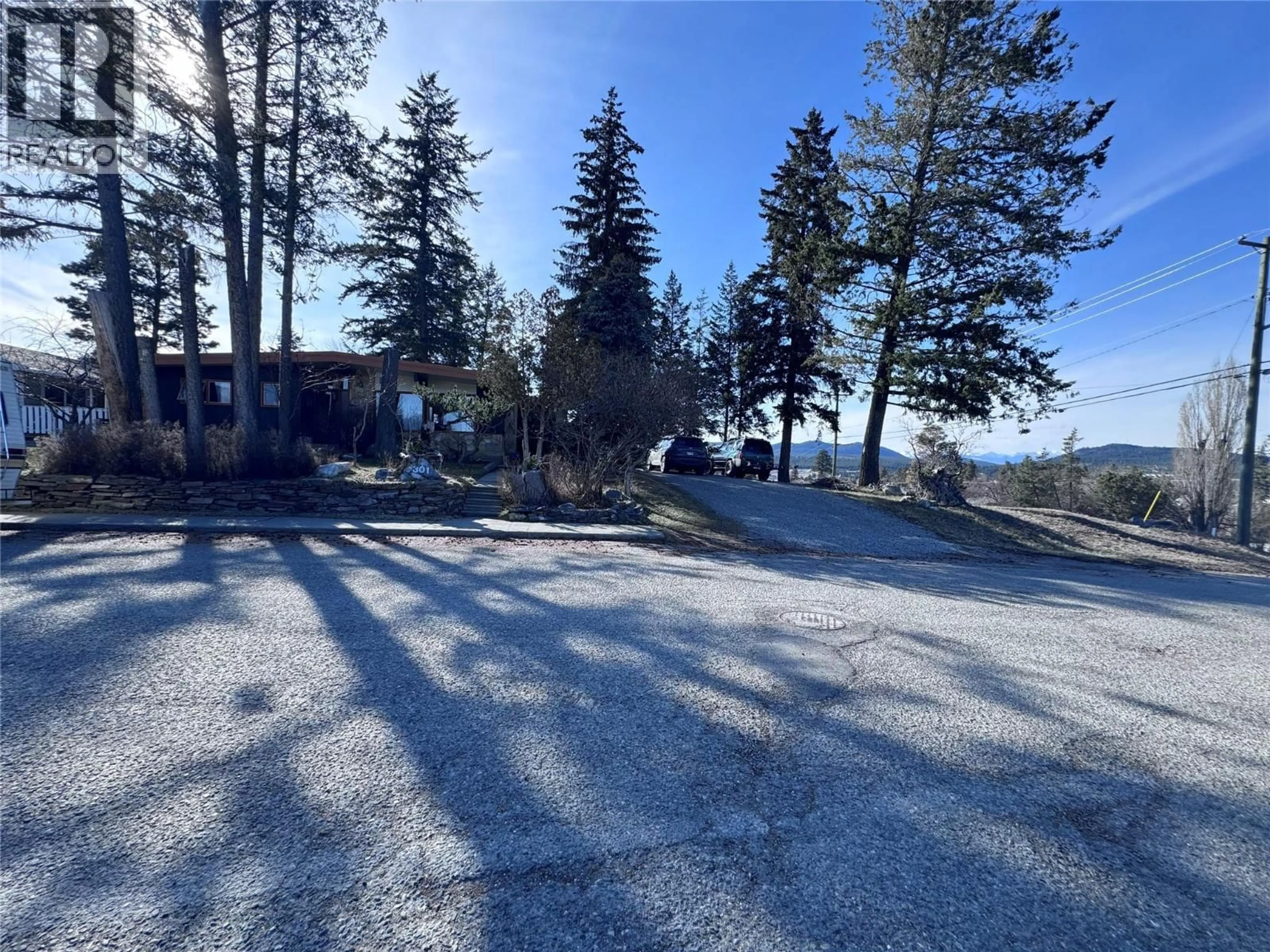 A pic from outside/outdoor area/front of a property/back of a property/a pic from drone, water/lake/river/ocean view for 301 19TH AVENUE SOUTH, Cranbrook British Columbia V1C3E3