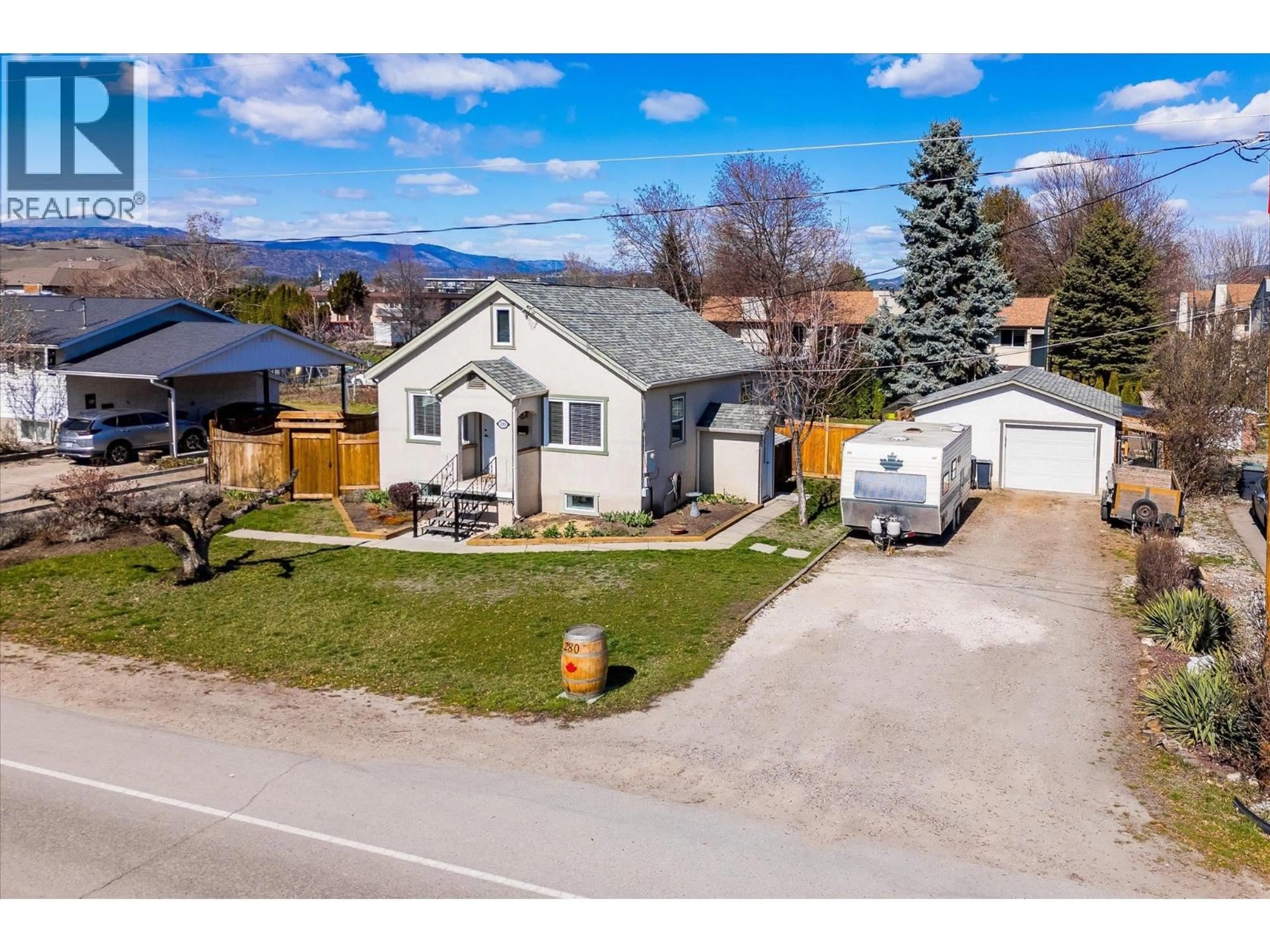 A pic from outside/outdoor area/front of a property/back of a property/a pic from drone, street for 280 MUGFORD ROAD, Kelowna British Columbia V1X2E2